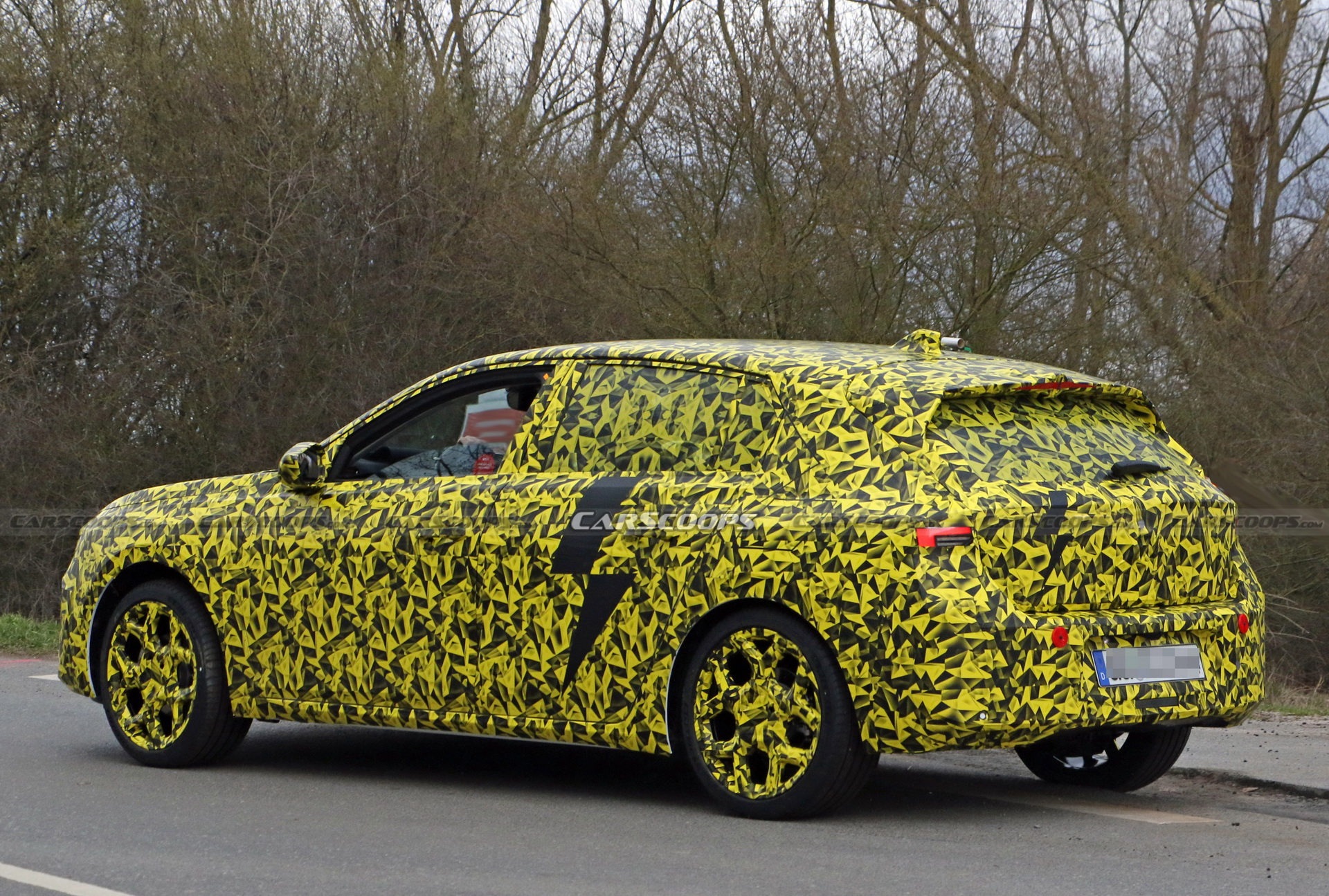 2022 Opel Astra Makes Spy Debut With A Not-So-Subtle Yellow Camo Wrap