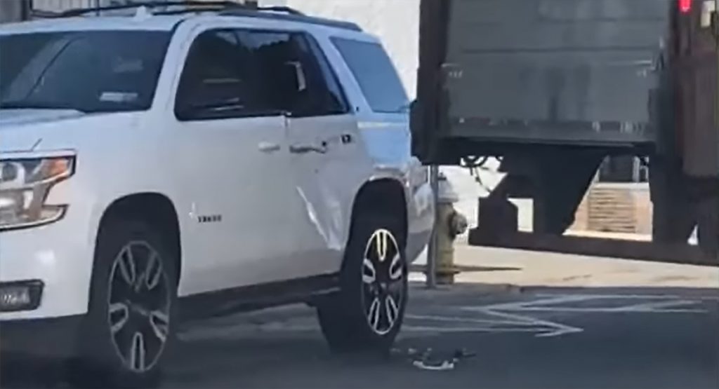 Semi Truck Smashes Parked Chevy Tahoe While Trying To Maneuver
