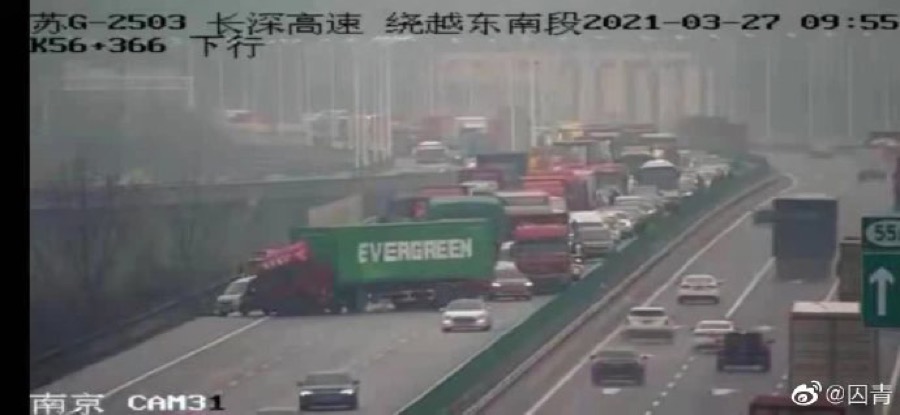 You Can’t Make It Up: Evergreen Truck Container Mimics Suez Ship Accident By Blocking Highway