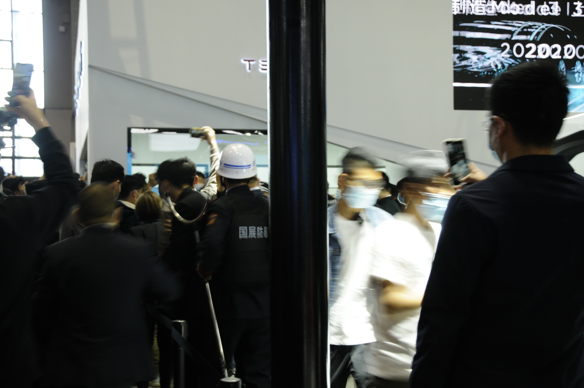 Angry Tesla Owner Jumps On Model 3 At Shanghai Show To Protest Her EV’s Faulty Brakes