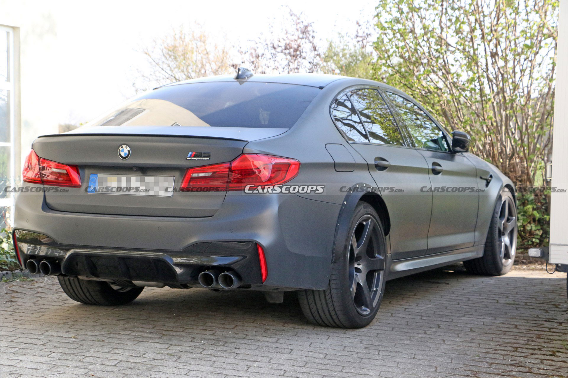 Mysterious BMW M5 Spied With A Wider Rear Track, Could It Be A CSL?