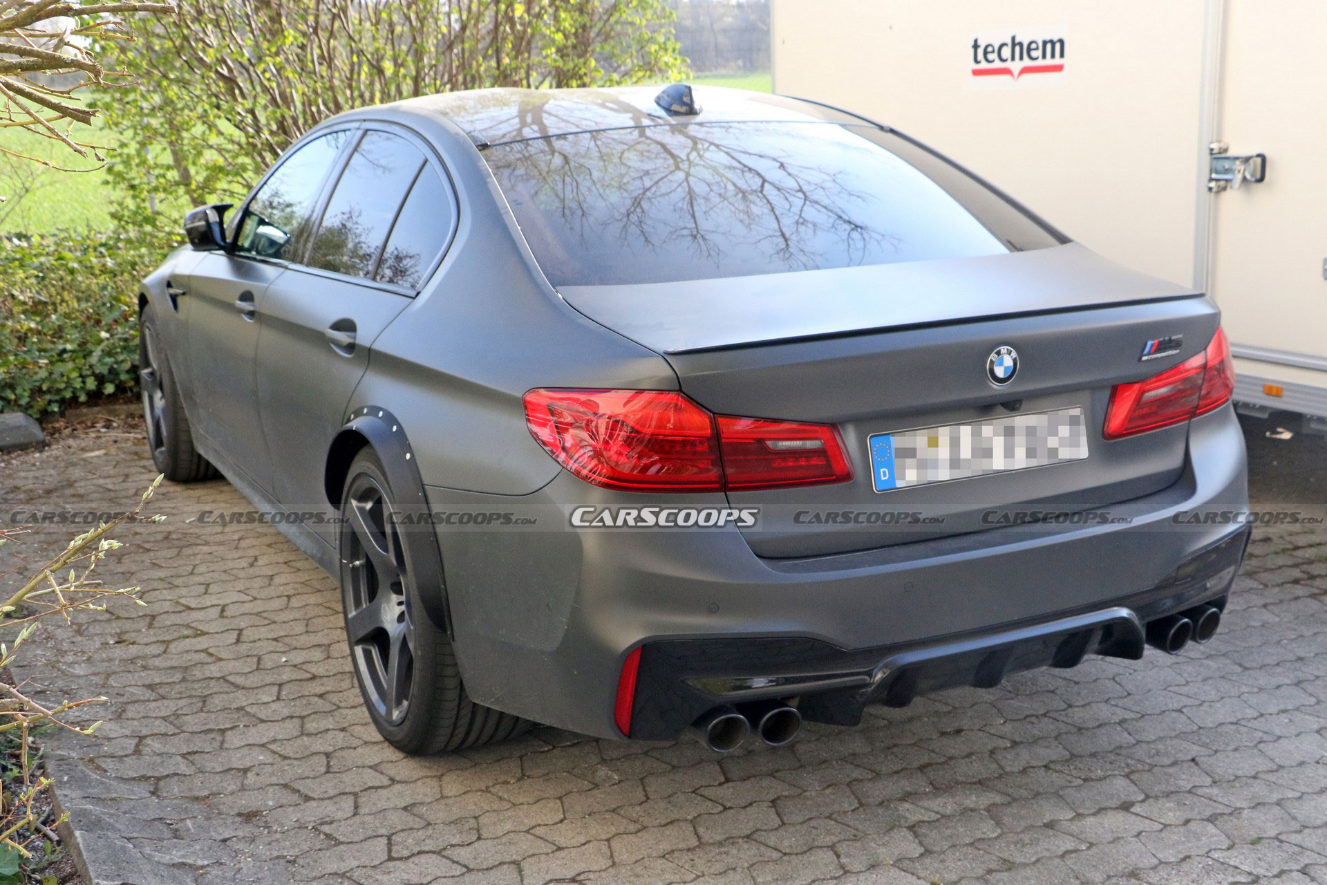 Mysterious BMW M5 Spied With A Wider Rear Track, Could It Be A CSL?