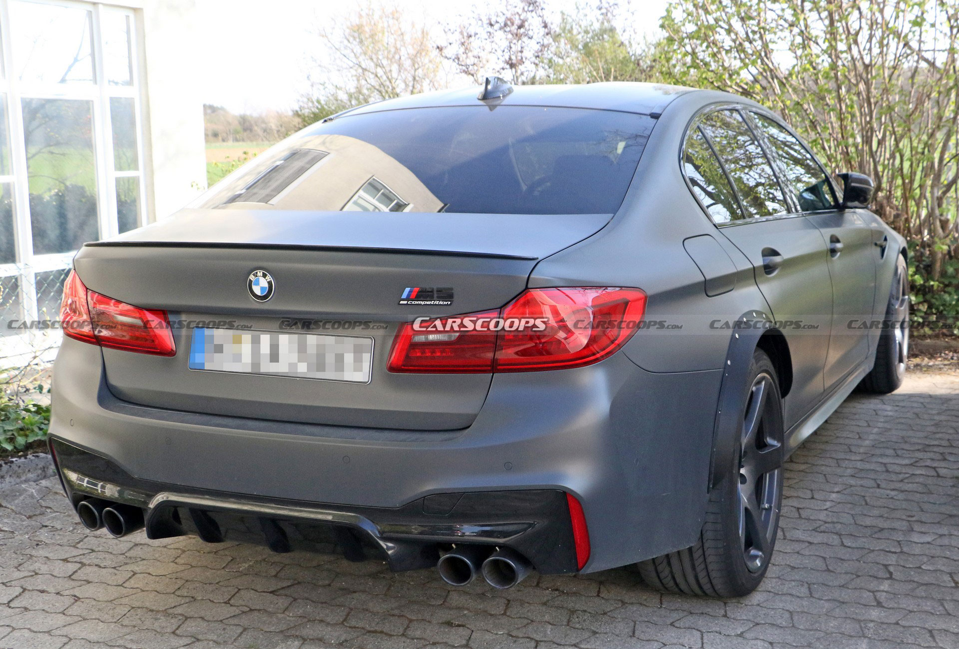 Mysterious BMW M5 Spied With A Wider Rear Track, Could It Be A CSL?