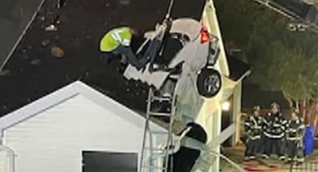  Chevy Malibu Crashes Through The Roof Of A House, Somehow No One Gets Hurt