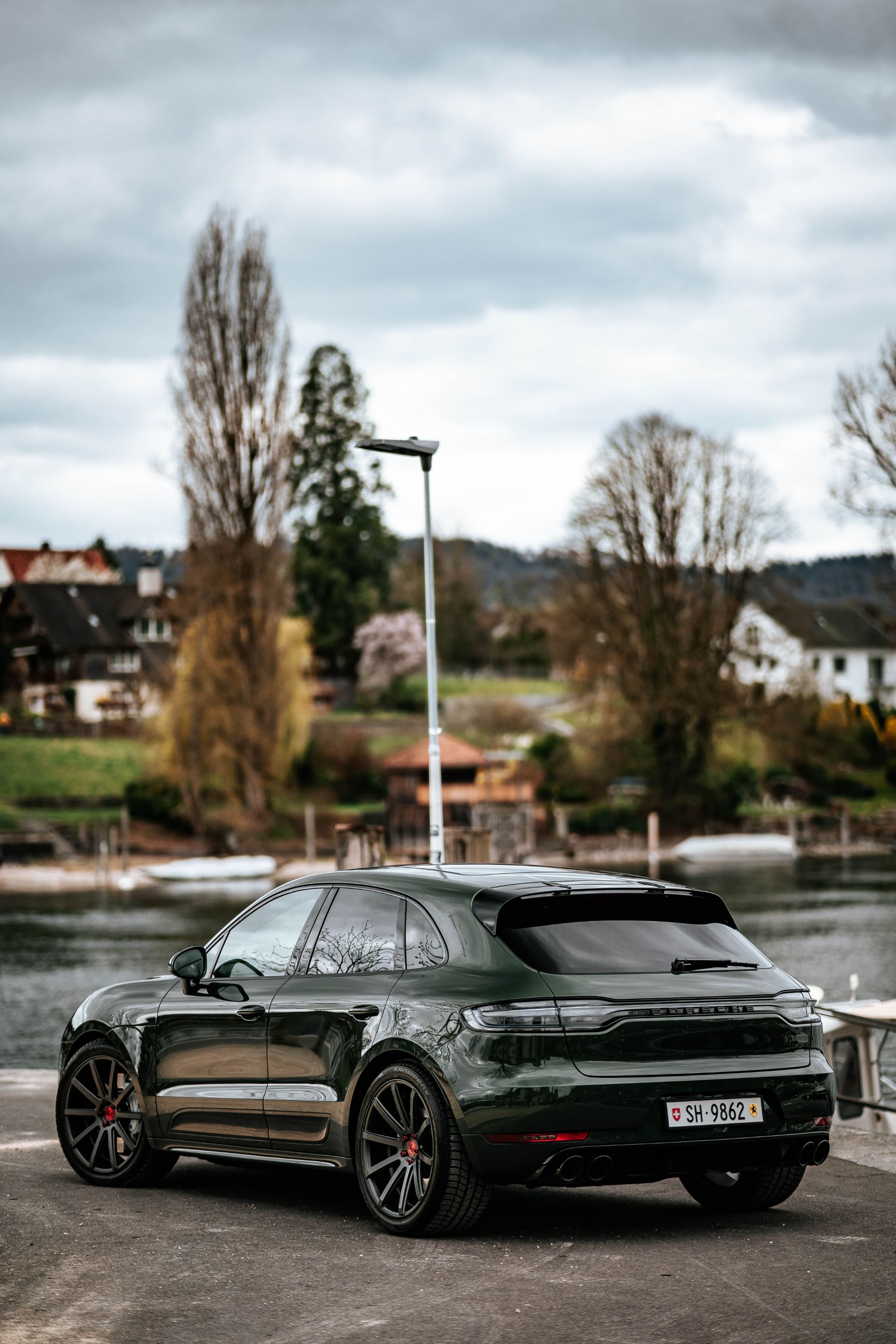Dark Green Porsche Macan Turbo Lowers Its Off-Road Expectations With 21-in Rims