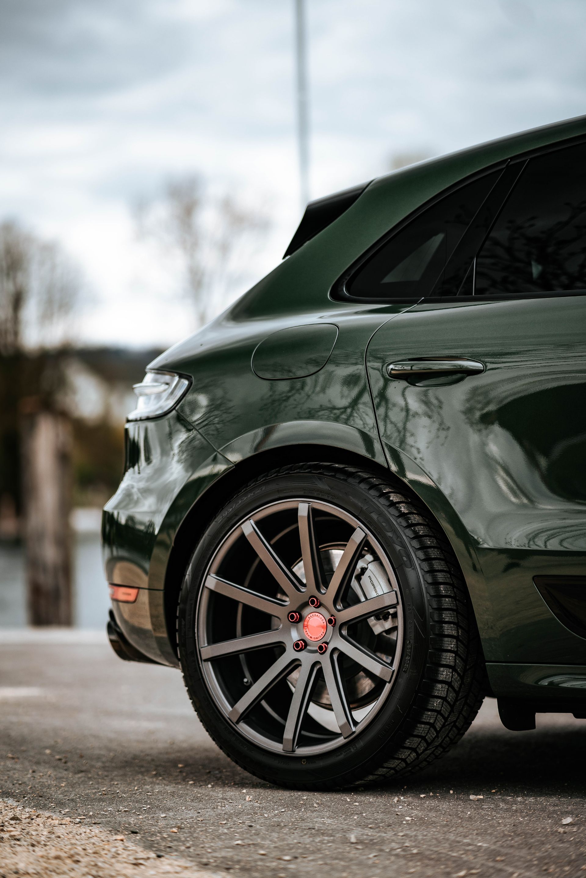 Dark Green Porsche Macan Turbo Lowers Its Off-Road Expectations With 21-in Rims