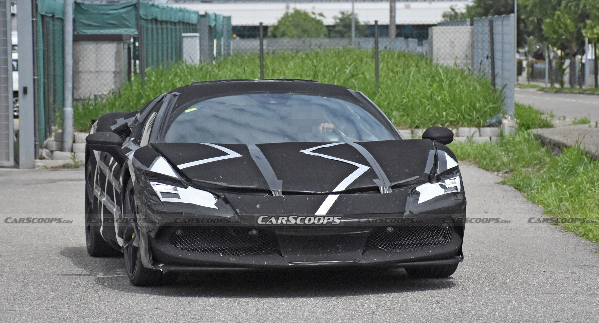 Ferrari’s V6 Hybrid Sports Car Shows Off A Little More Of Its Design Under New Camouflage