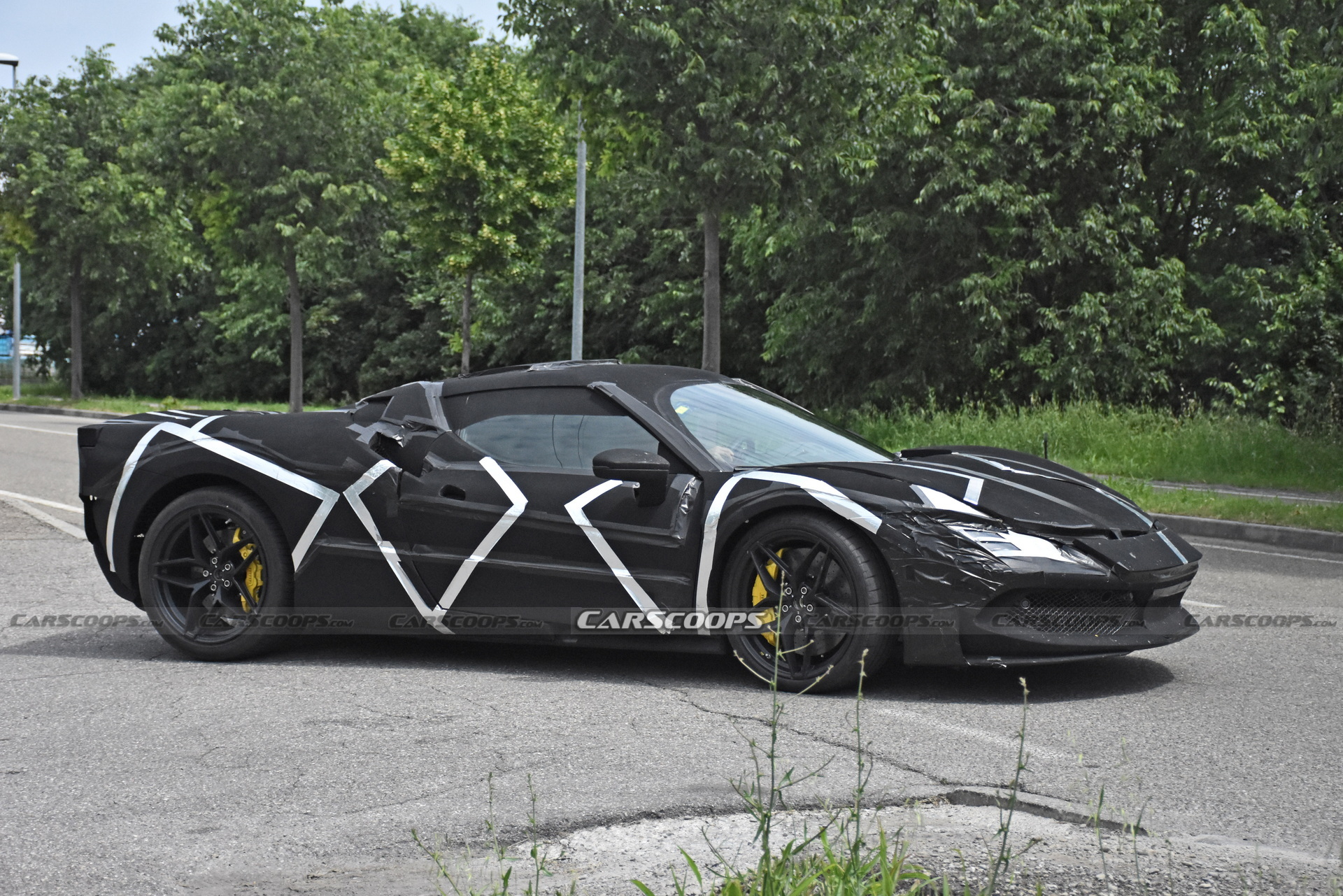 Ferrari’s V6 Hybrid Sports Car Shows Off A Little More Of Its Design Under New Camouflage