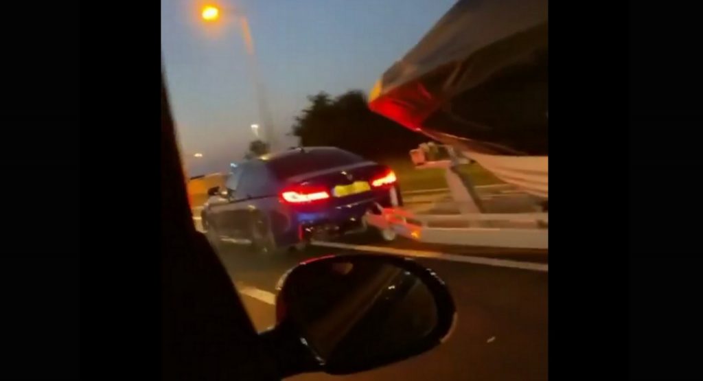 BMW M5 Towing Massive Boat Races VW Golf GTI At The Lights