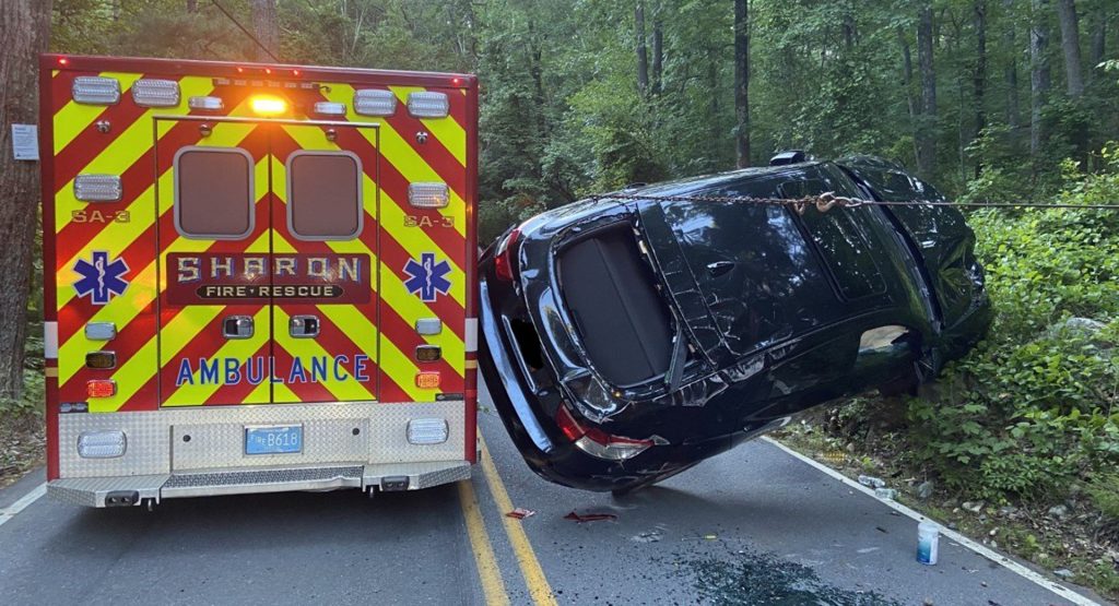 “Overcompensating” BMW X6 Driver Dangles In The Air After Trying To Pass An Ambulance