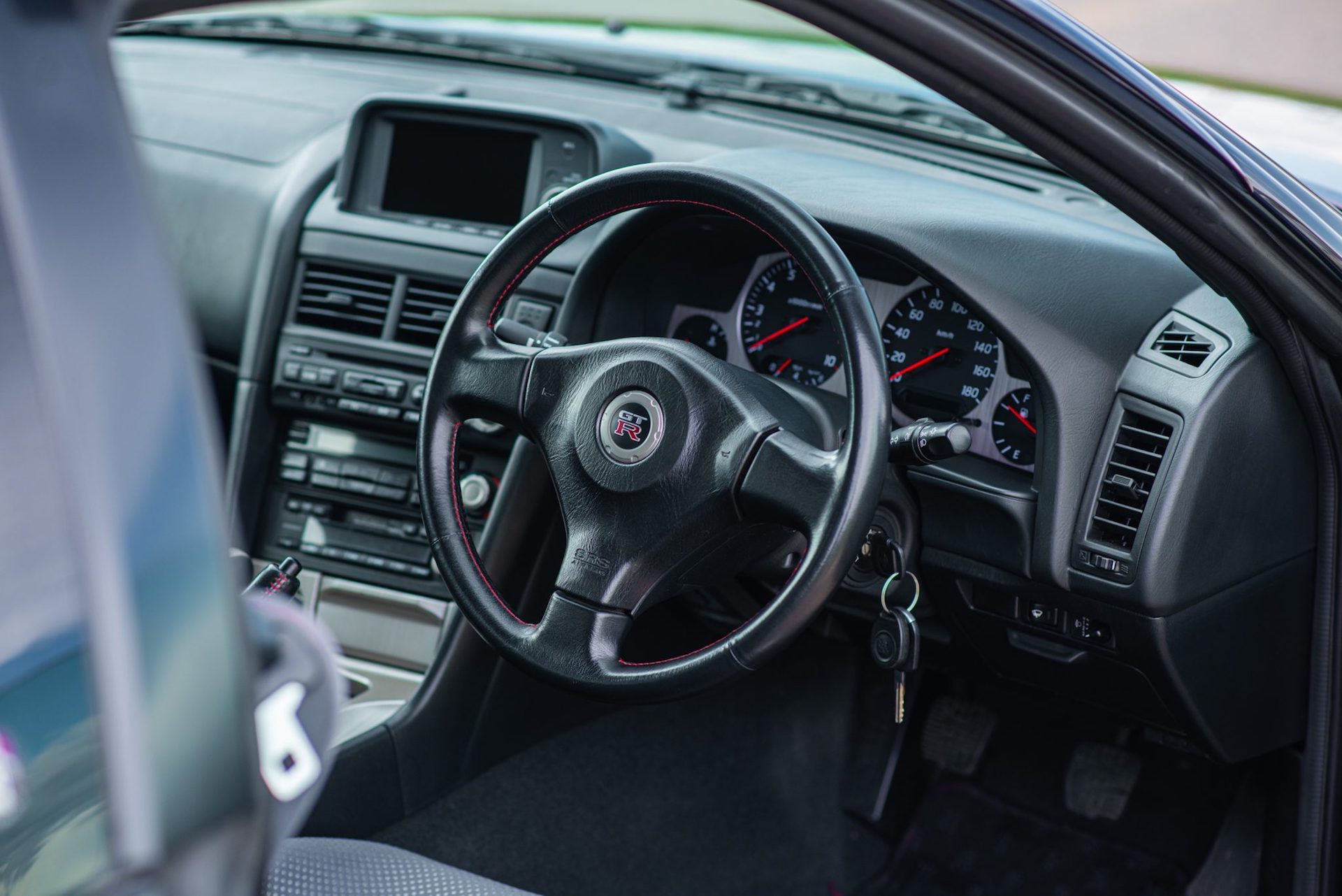 This Midnight Purple II 1999 Nissan Skyline GT-R Could Sell For $400k