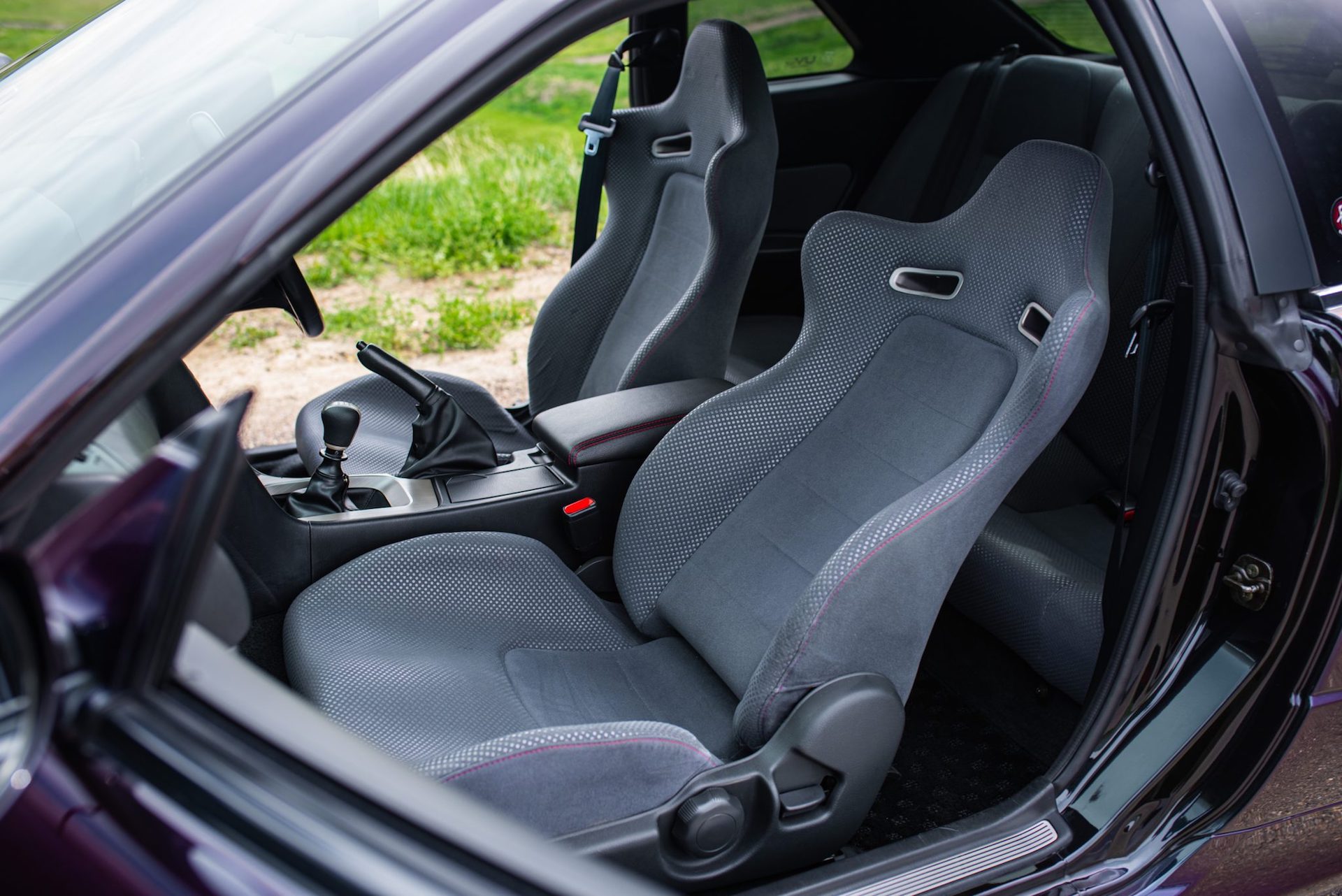 This Midnight Purple II 1999 Nissan Skyline GT-R Could Sell For $400k