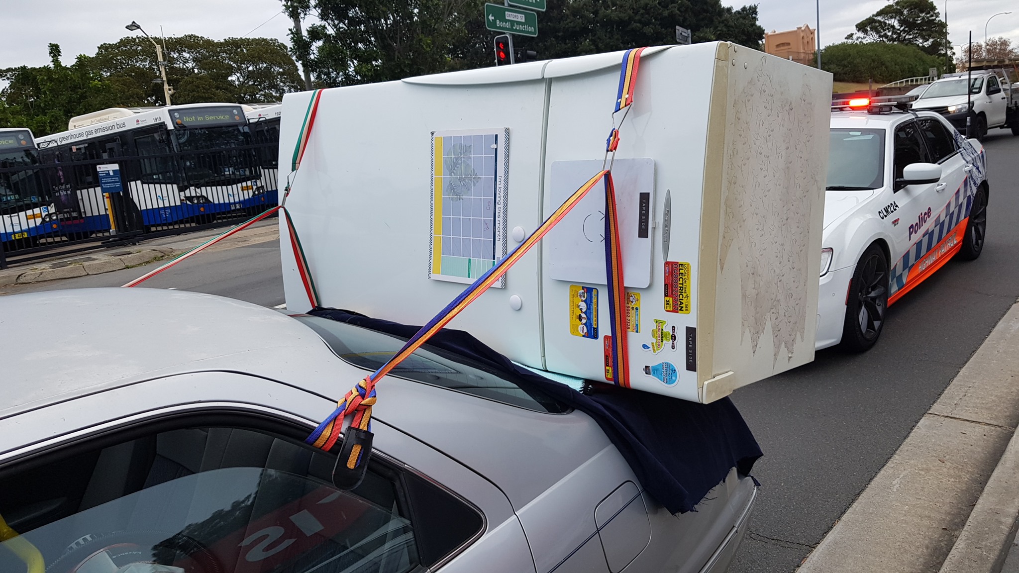 Aussie Tries To Carry Fridge On A Toyota Camry, Police Aren’t Impressed
