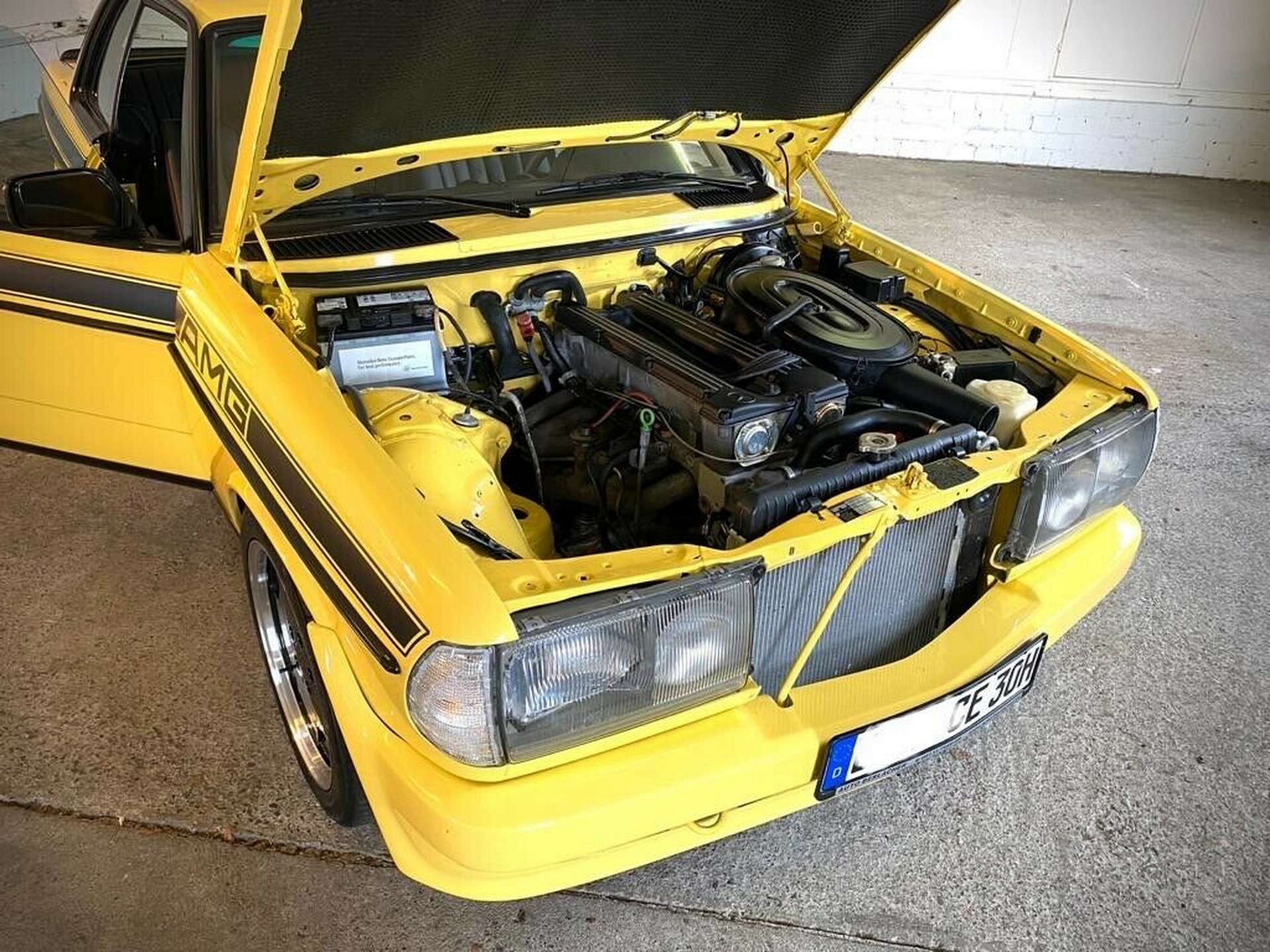 Mercedes W123 280CE With Zender And AMG Styling Is A Bright Yellow Youngtimer