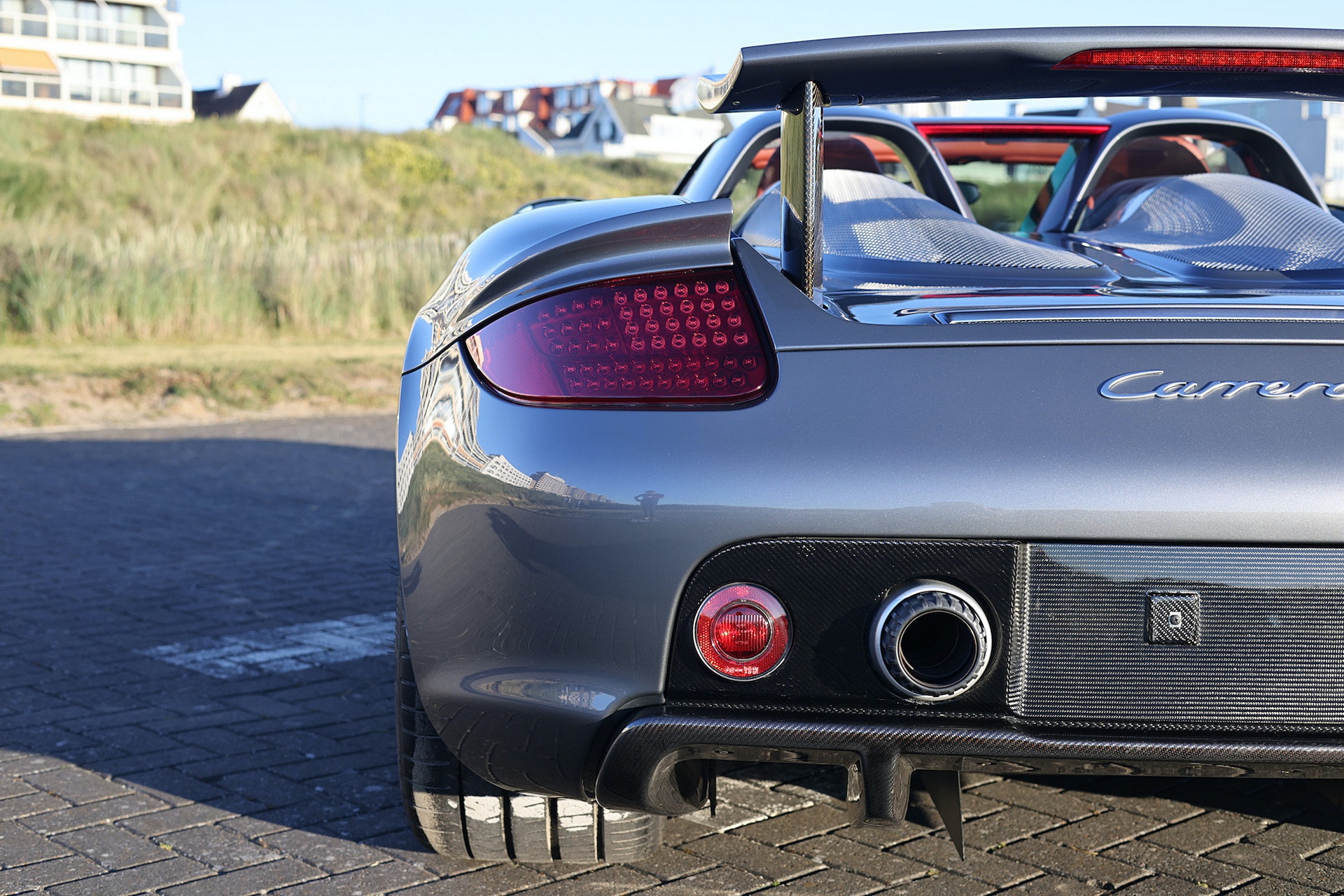 Porsche Carrera GT Once Owned By F1 Champ Jenson Button Sells Just Shy Of $1M