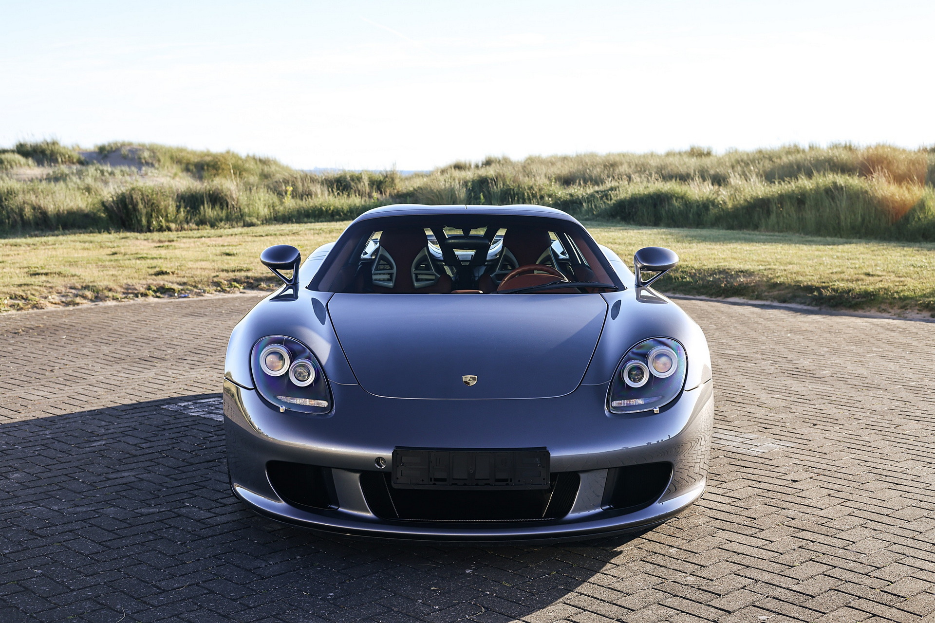 Porsche Carrera GT Once Owned By F1 Champ Jenson Button Sells Just Shy Of $1M