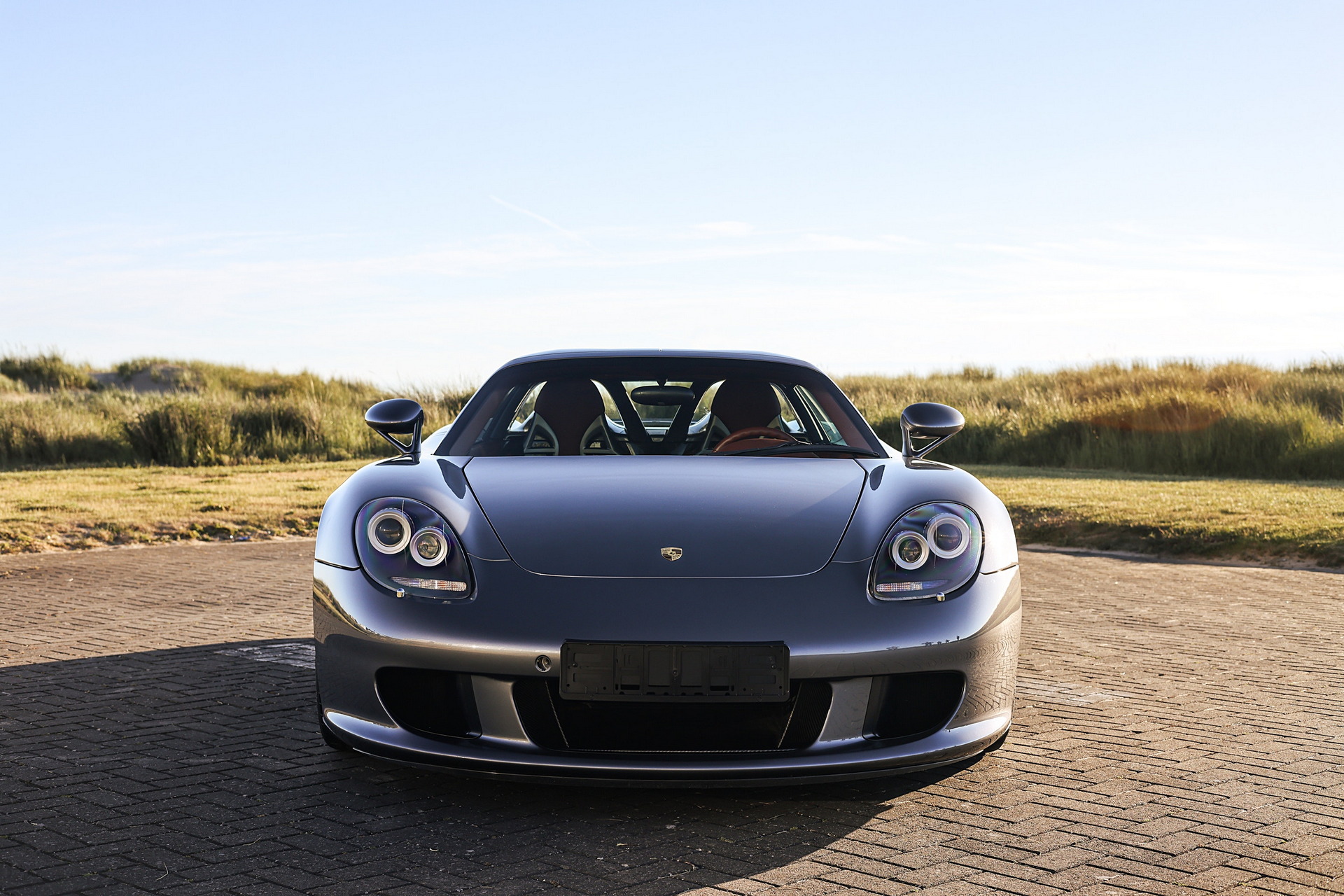 Porsche Carrera GT Once Owned By F1 Champ Jenson Button Sells Just Shy Of $1M