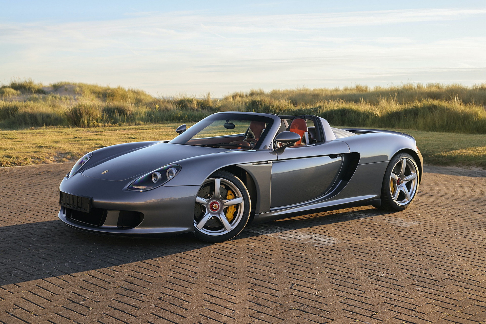 Porsche Carrera GT Once Owned By F1 Champ Jenson Button Sells Just Shy Of $1M