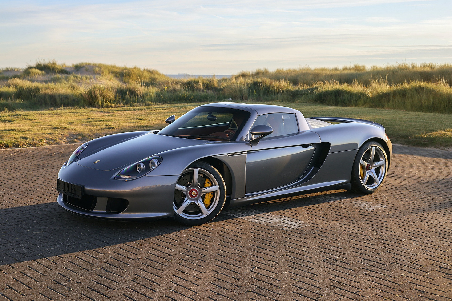 Porsche Carrera GT Once Owned By F1 Champ Jenson Button Sells Just Shy Of $1M