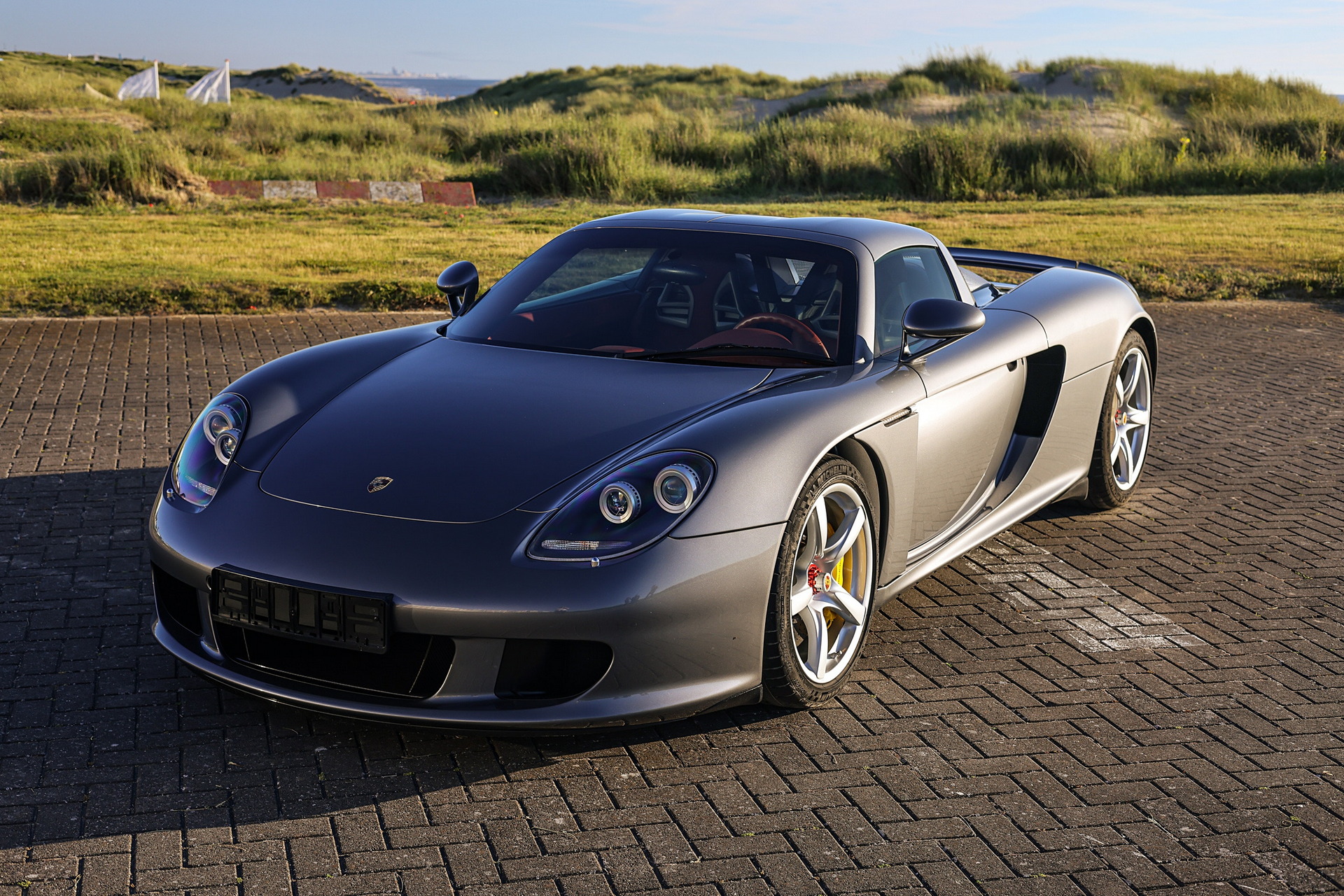 Porsche Carrera GT Once Owned By F1 Champ Jenson Button Sells Just Shy Of $1M