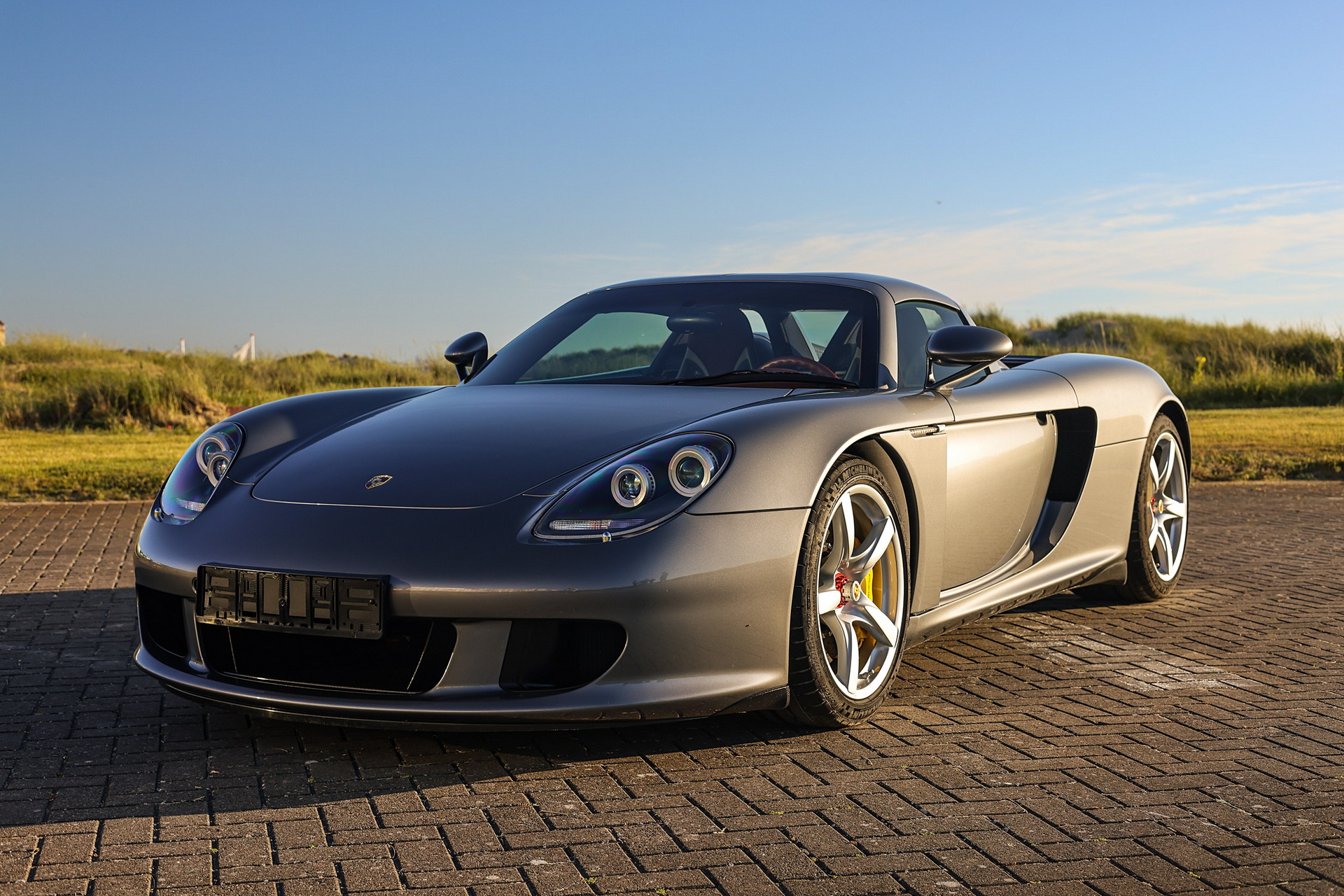 Porsche Carrera GT Once Owned By F1 Champ Jenson Button Sells Just Shy Of $1M