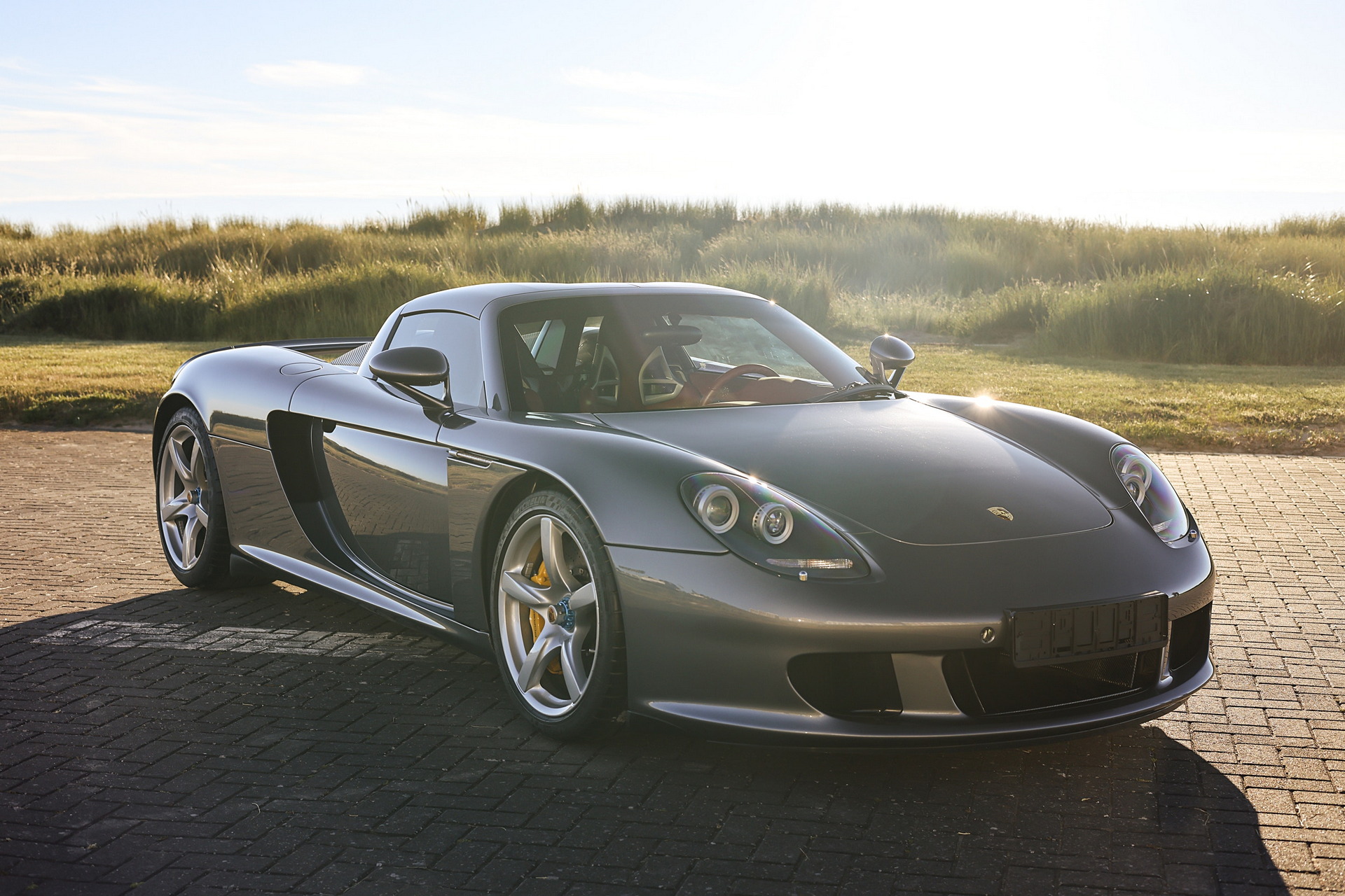 Porsche Carrera GT Once Owned By F1 Champ Jenson Button Sells Just Shy Of $1M