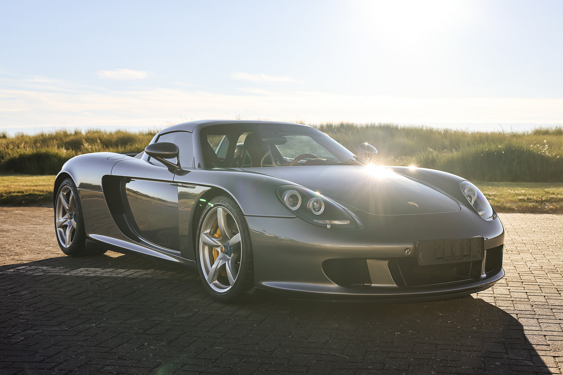 Porsche Carrera GT Once Owned By F1 Champ Jenson Button Sells Just Shy Of $1M