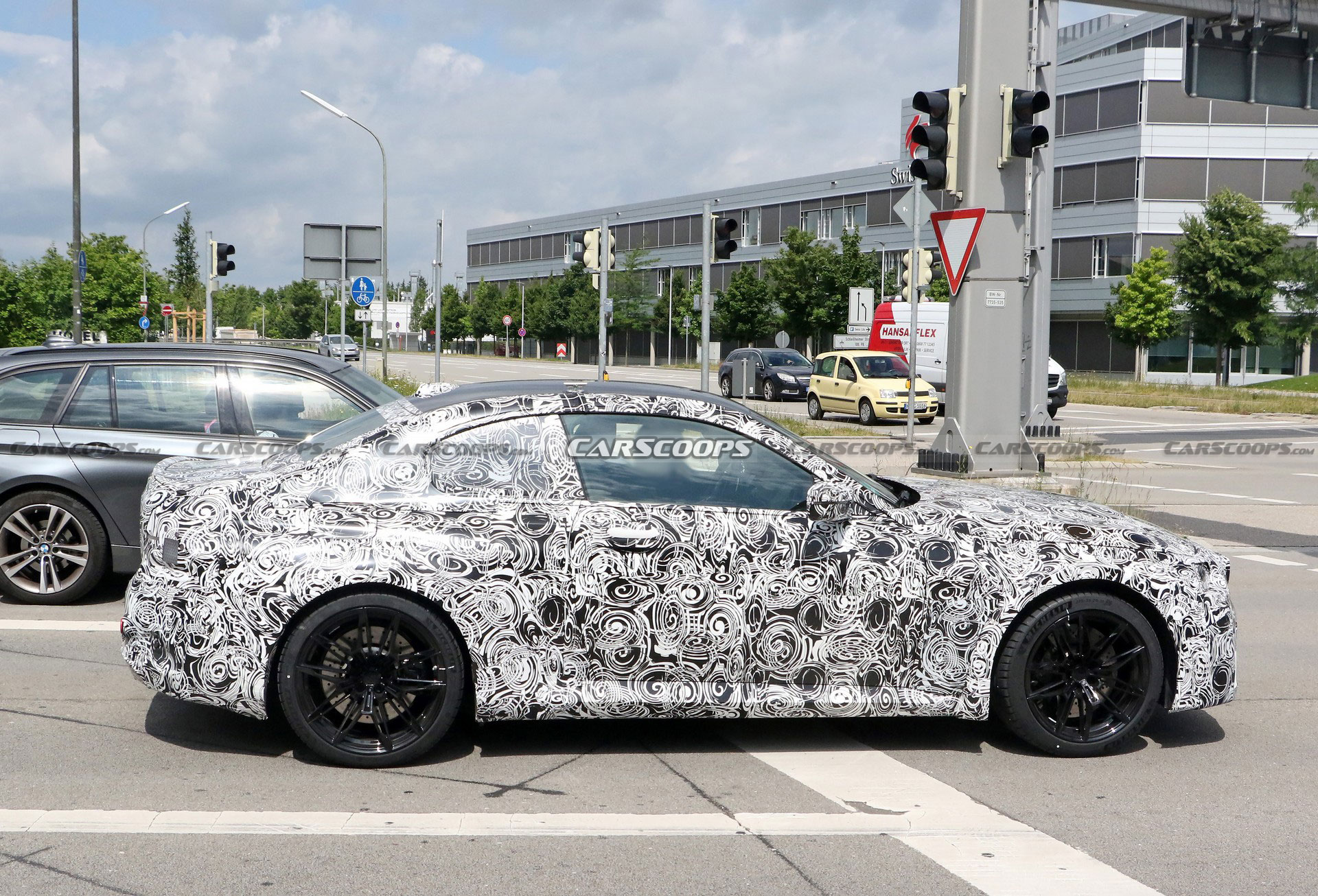 2023 BMW M2 Spied With An iX-Style Curved Display