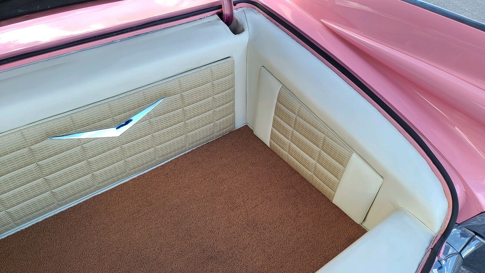 Bright Pink Cadillac Coupe de Ville Is A Surefire Way To Turn Heads