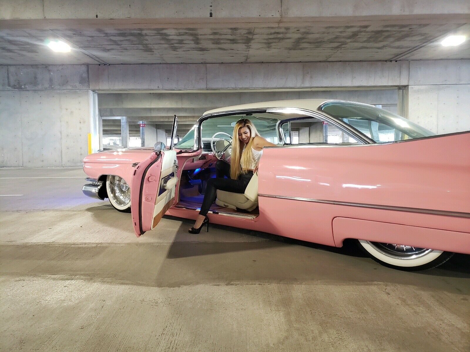 Bright Pink Cadillac Coupe de Ville Is A Surefire Way To Turn Heads