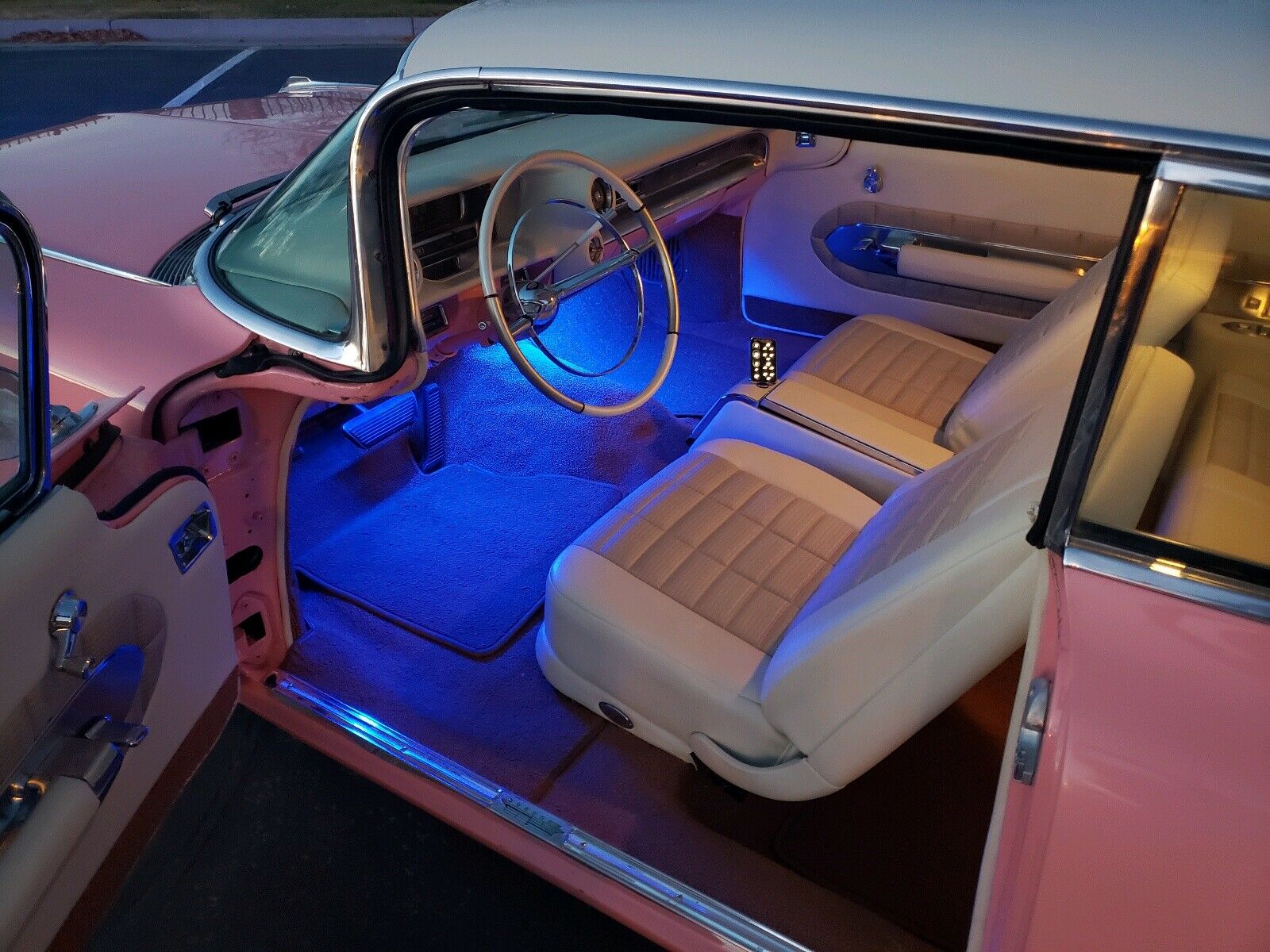 Bright Pink Cadillac Coupe de Ville Is A Surefire Way To Turn Heads