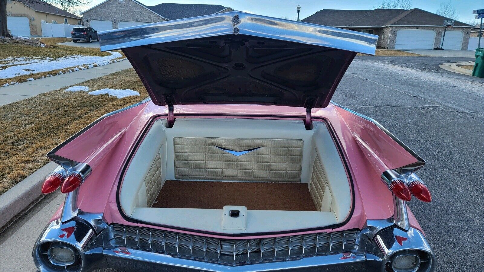 Bright Pink Cadillac Coupe de Ville Is A Surefire Way To Turn Heads