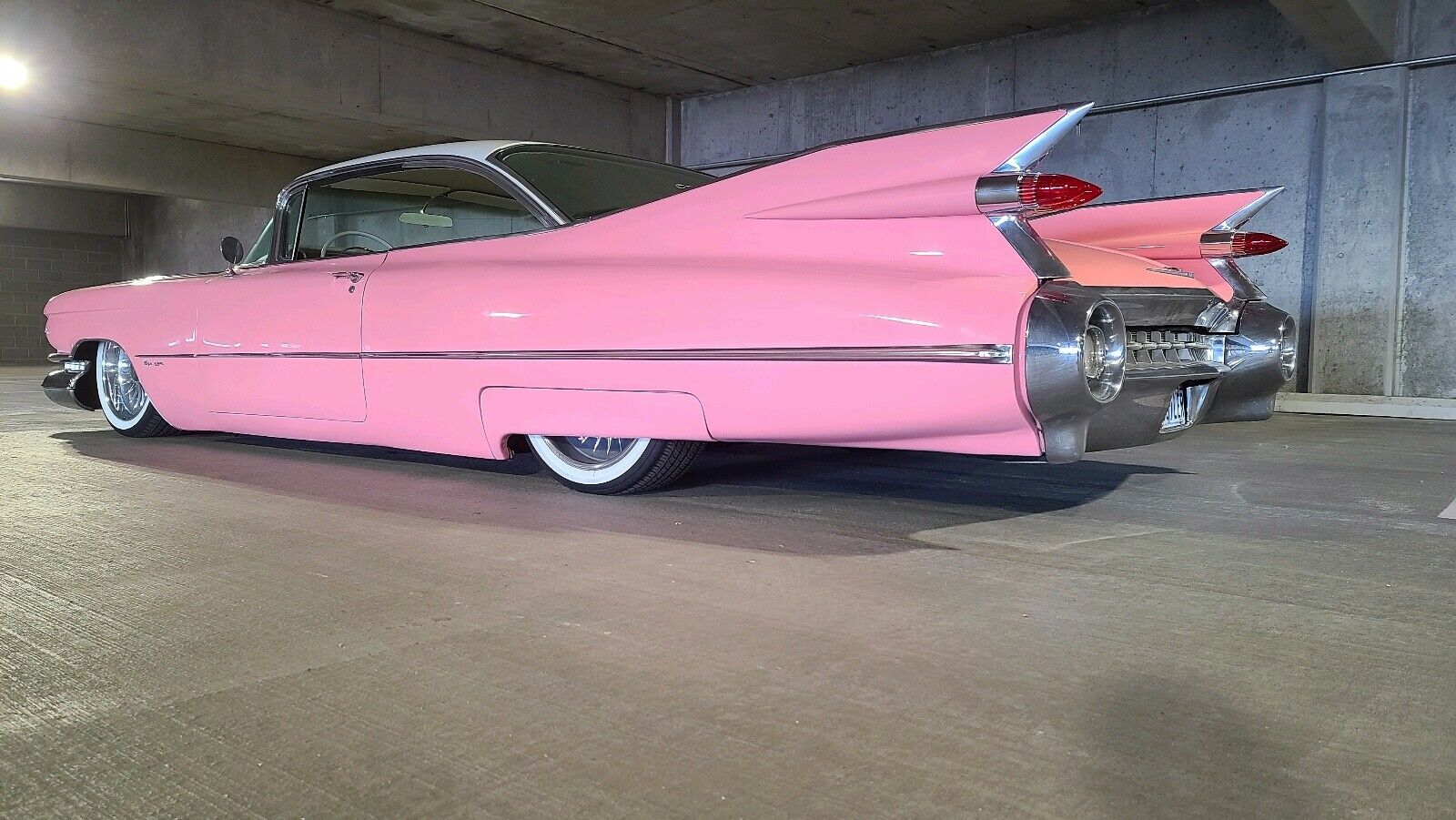 Bright Pink Cadillac Coupe de Ville Is A Surefire Way To Turn Heads