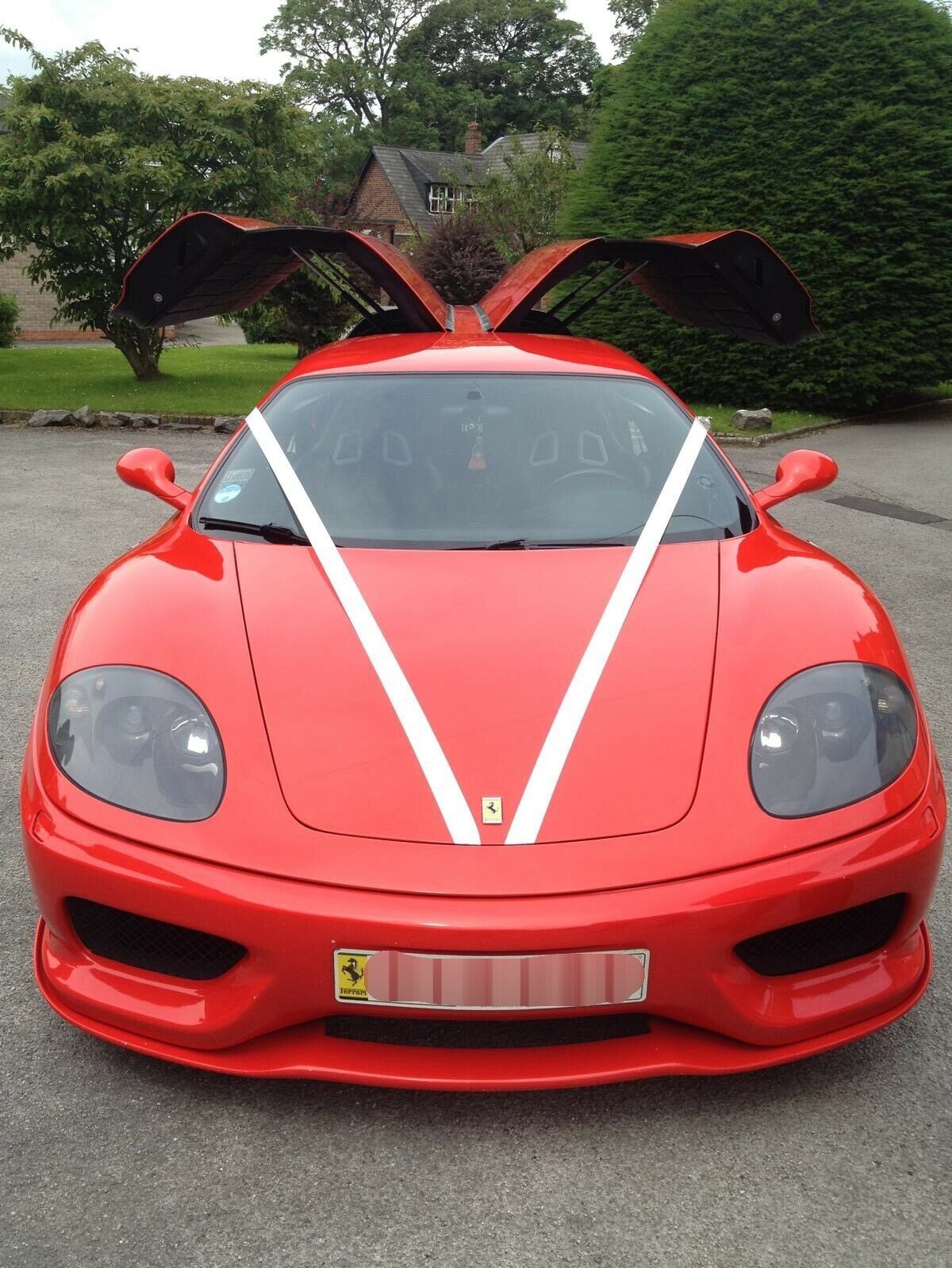 Would You Pay $200k For A Stretched Ferrari 360 Limo With Gullwing Doors And 8 Bucket Seats?