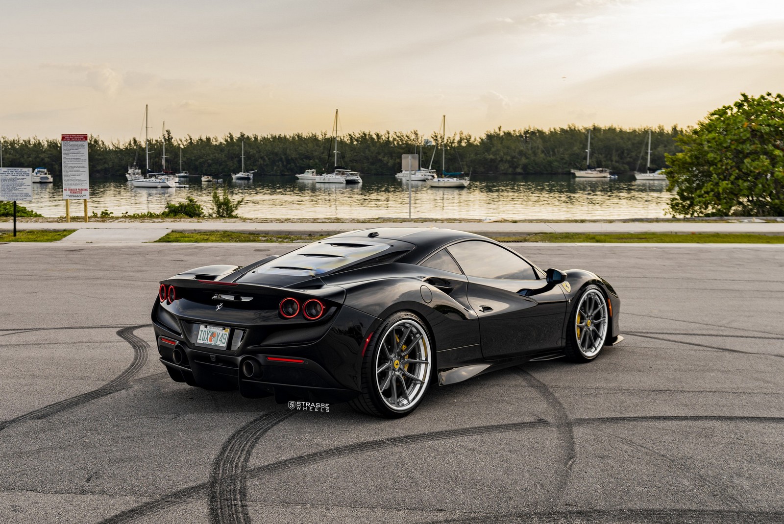 Pitch Black Ferrari F8 Tributo Looks Good With Dark Multi-Spoke Aftermarket Wheels
