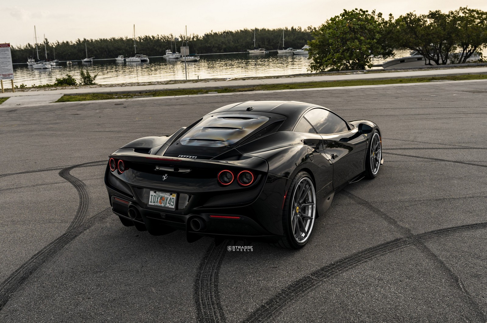 Pitch Black Ferrari F8 Tributo Looks Good With Dark Multi-Spoke Aftermarket Wheels
