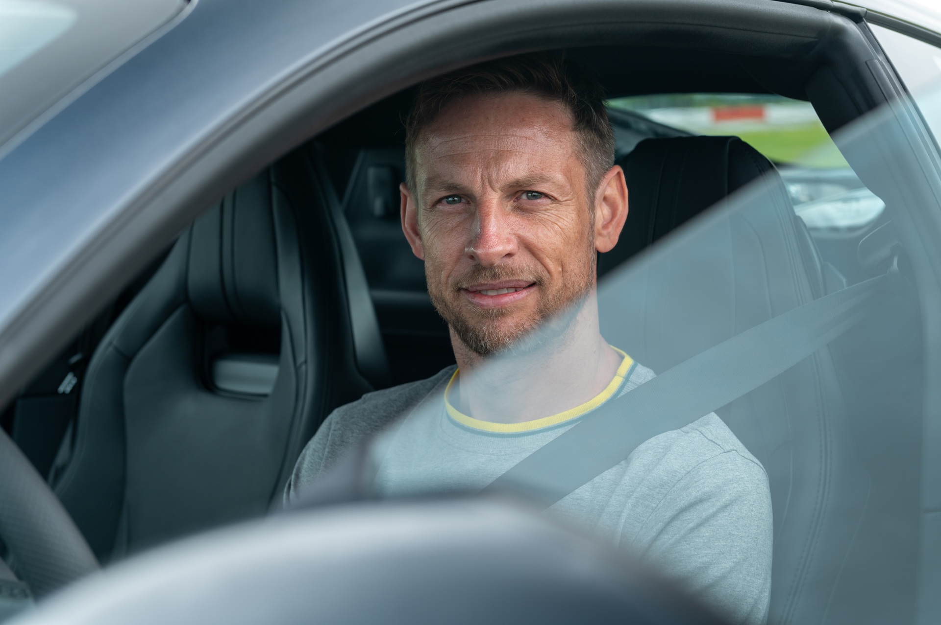 Jenson Button Drives The New Emira On Lotus’ Hethel Track