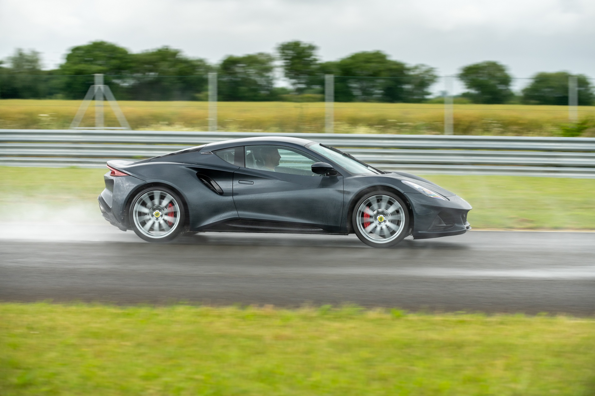 Jenson Button Drives The New Emira On Lotus’ Hethel Track