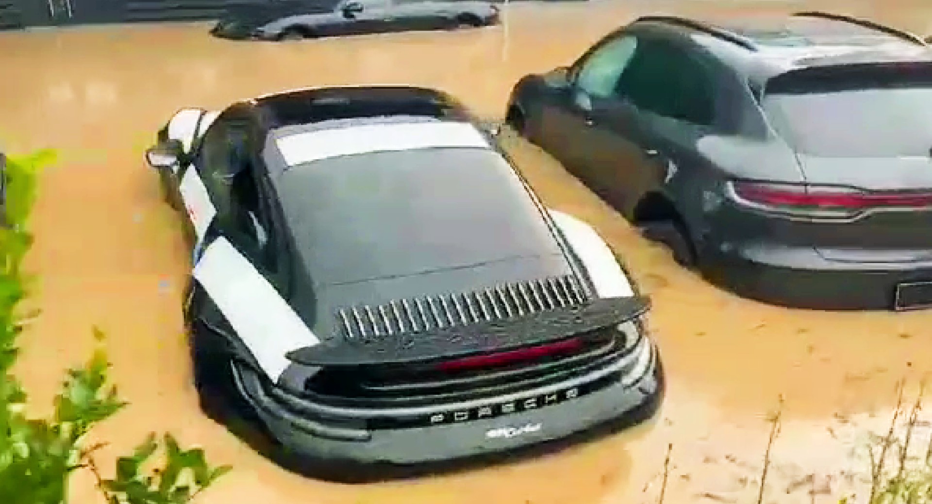 Brand New Porsches Under Water In German Dealership After Disastrous  Rainfall | Carscoops