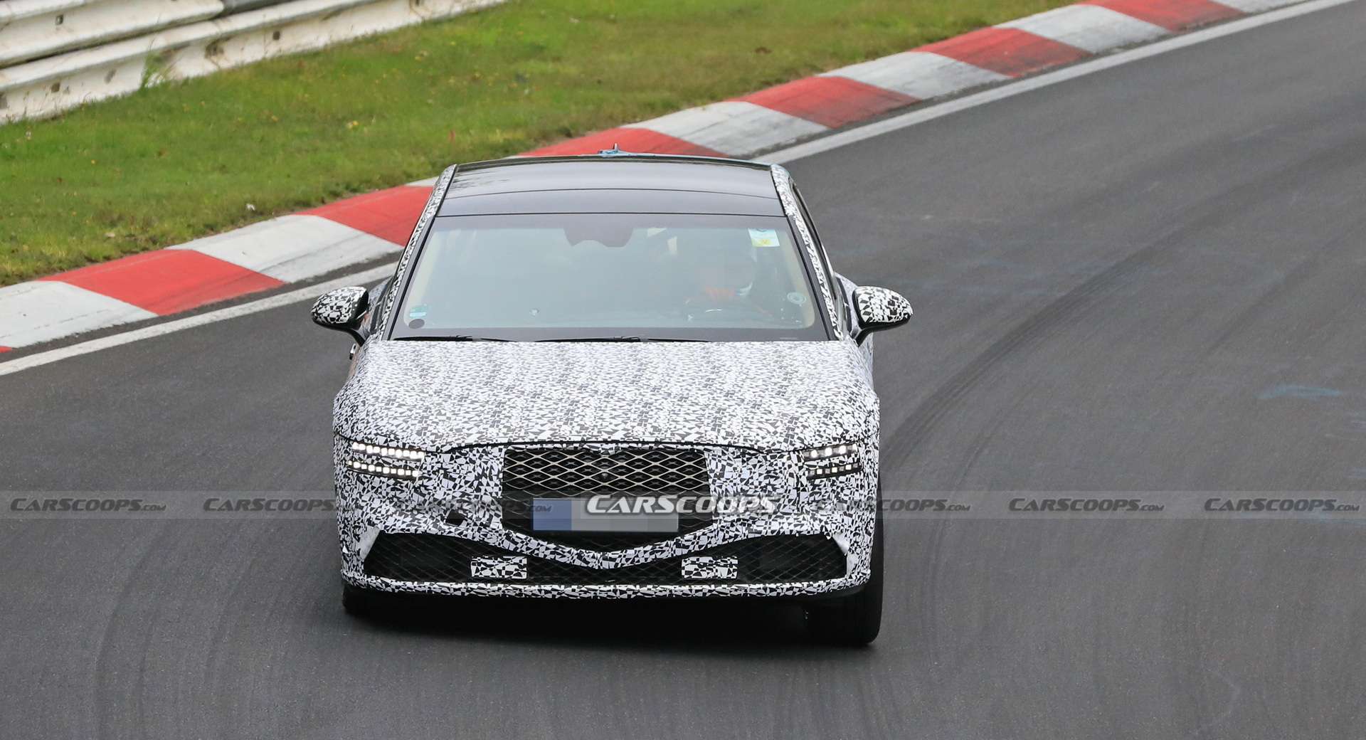 2022 Genesis G90 Caught With Less Camouflage Than Ever Before