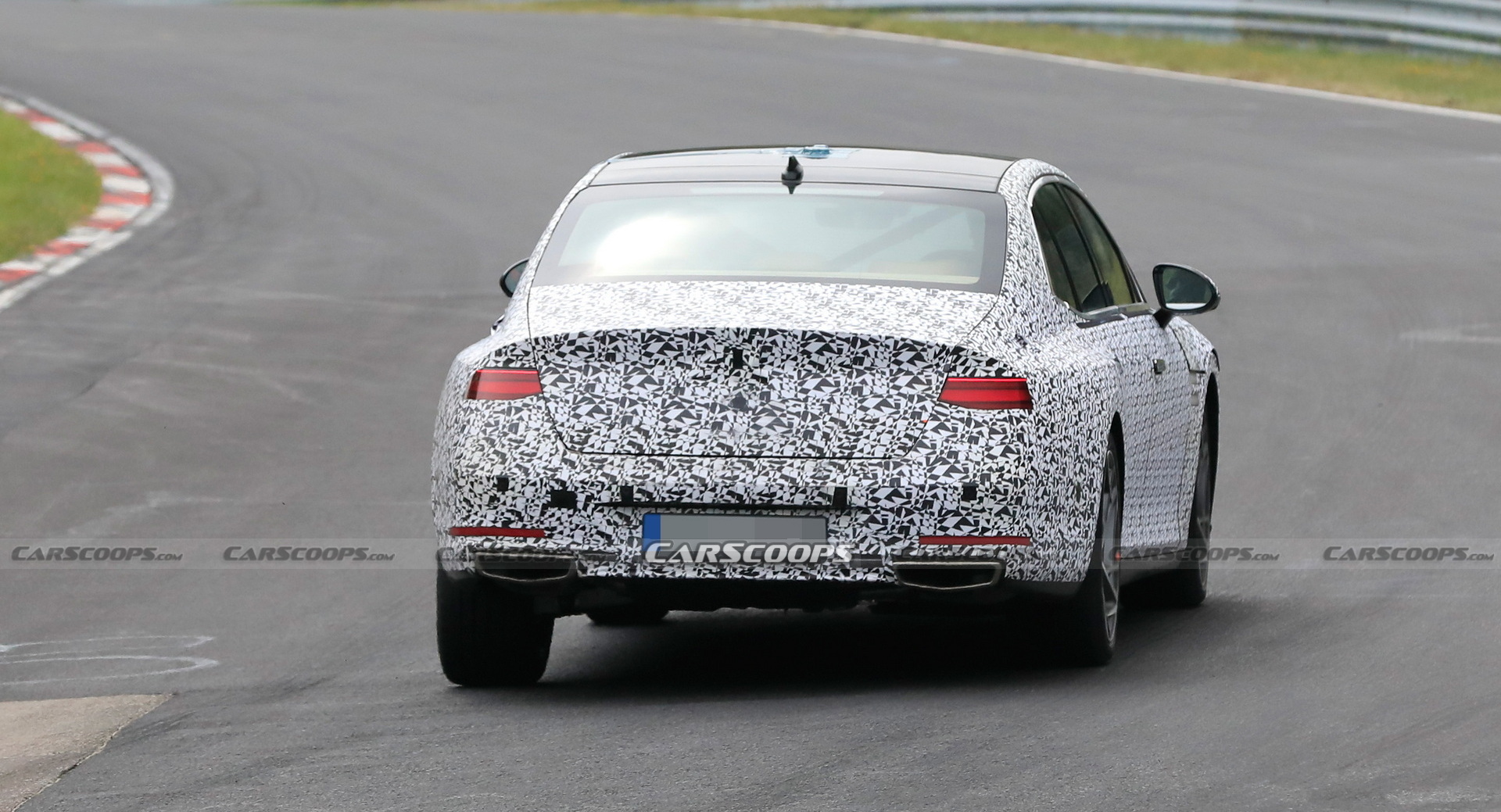 2022 Genesis G90 Caught With Less Camouflage Than Ever Before