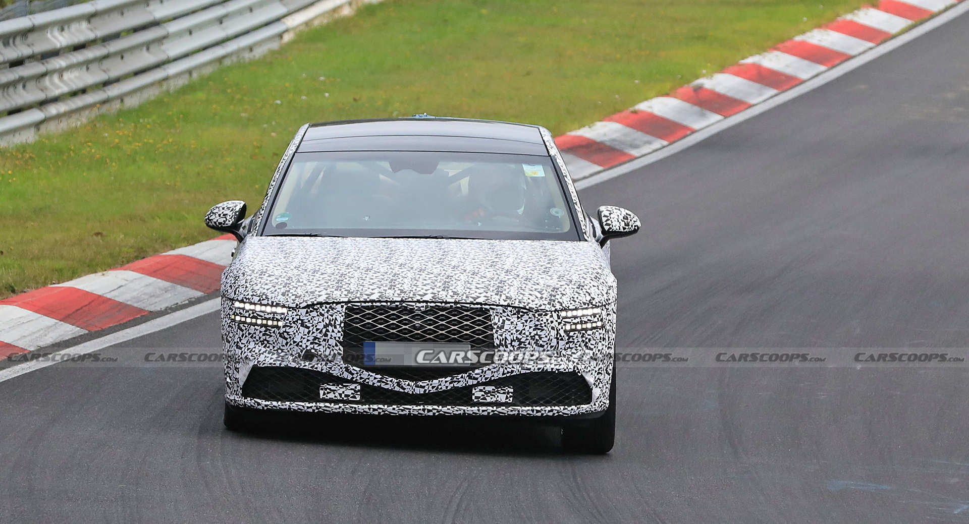 2022 Genesis G90 Caught With Less Camouflage Than Ever Before