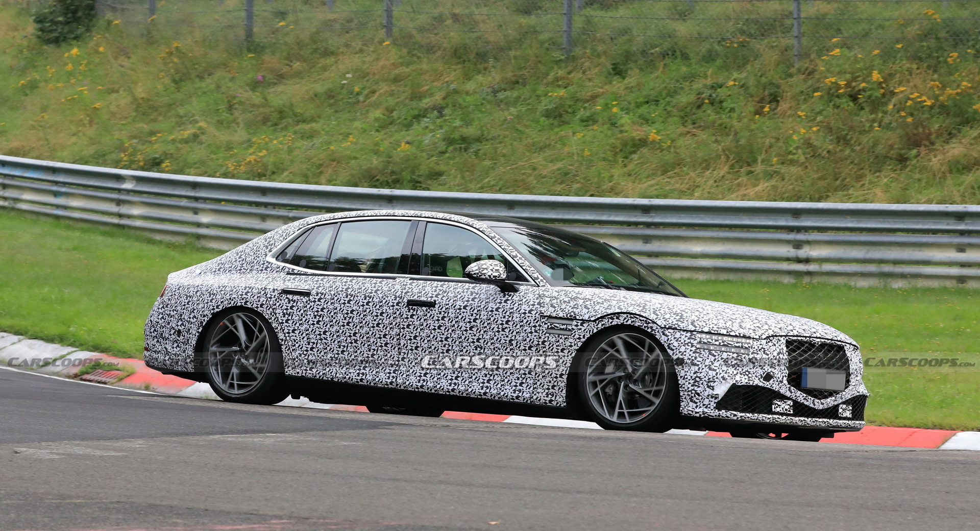 2022 Genesis G90 Caught With Less Camouflage Than Ever Before