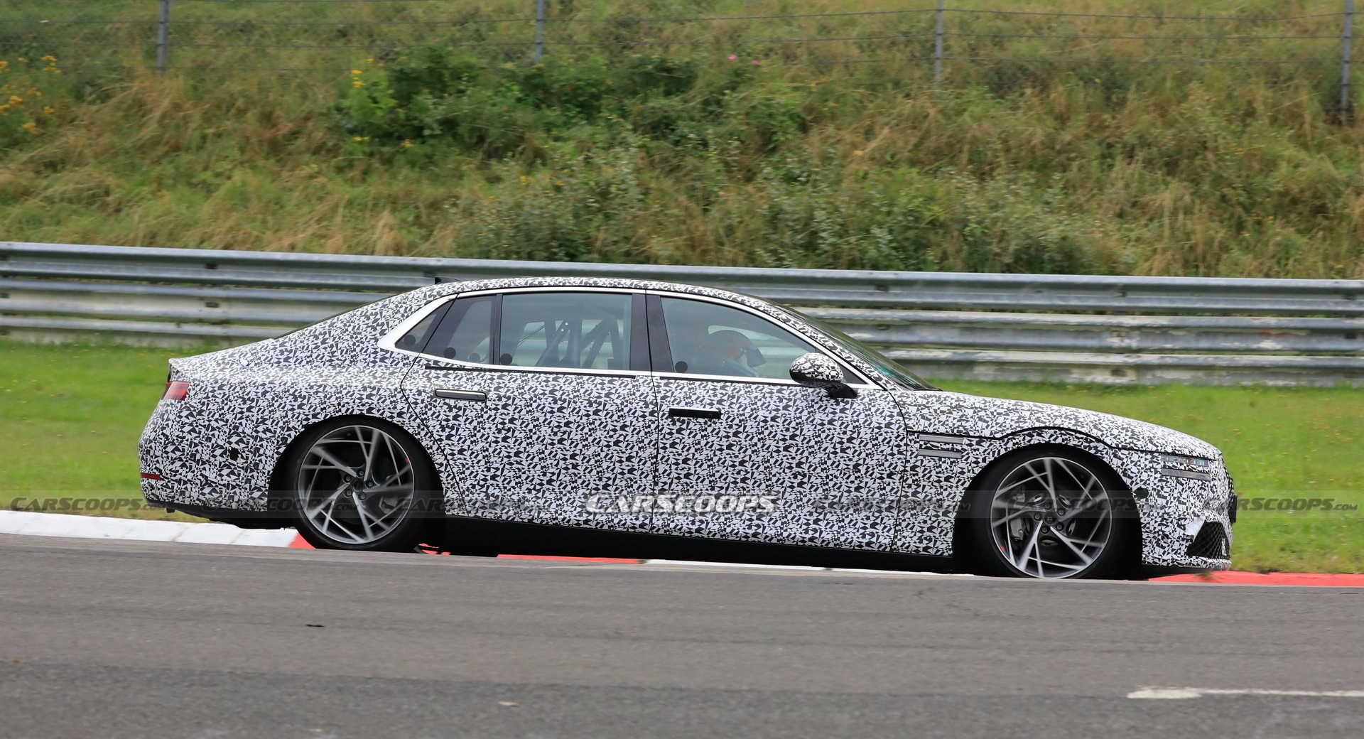 2022 Genesis G90 Caught With Less Camouflage Than Ever Before