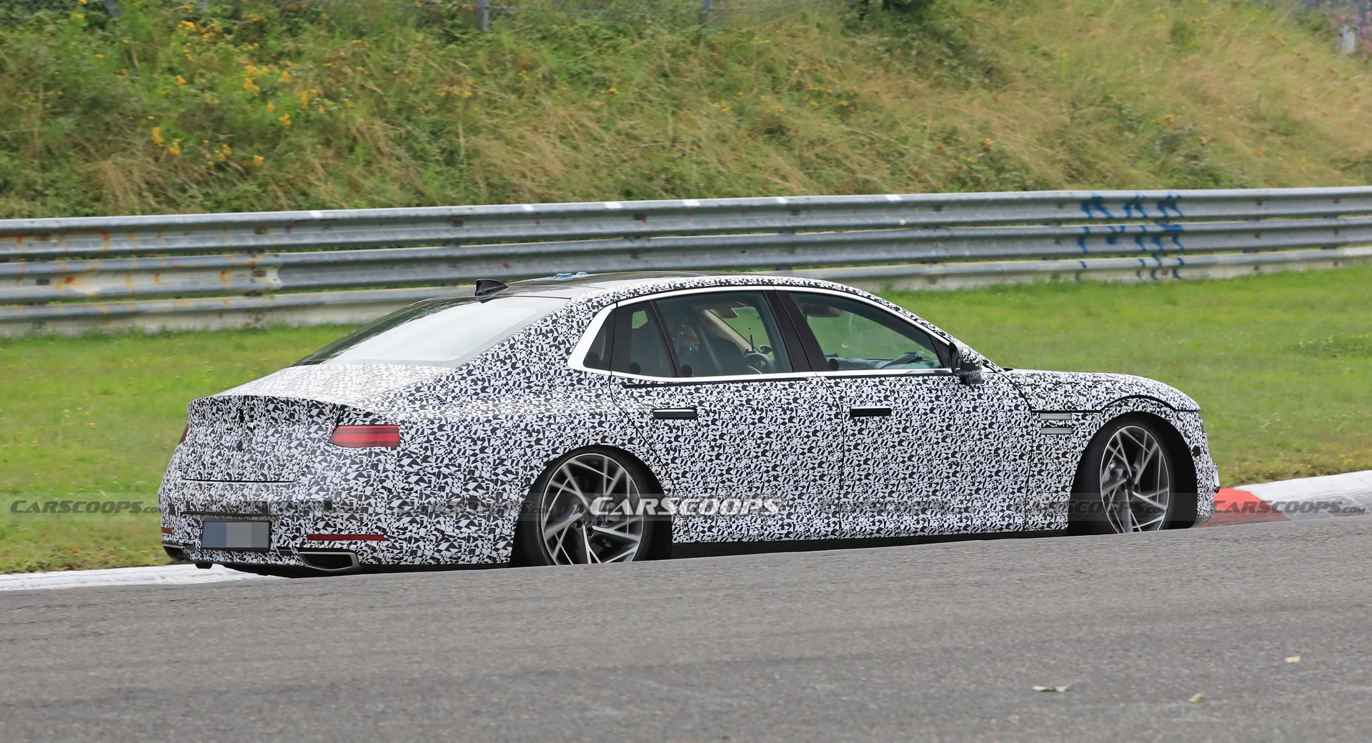 2022 Genesis G90 Caught With Less Camouflage Than Ever Before