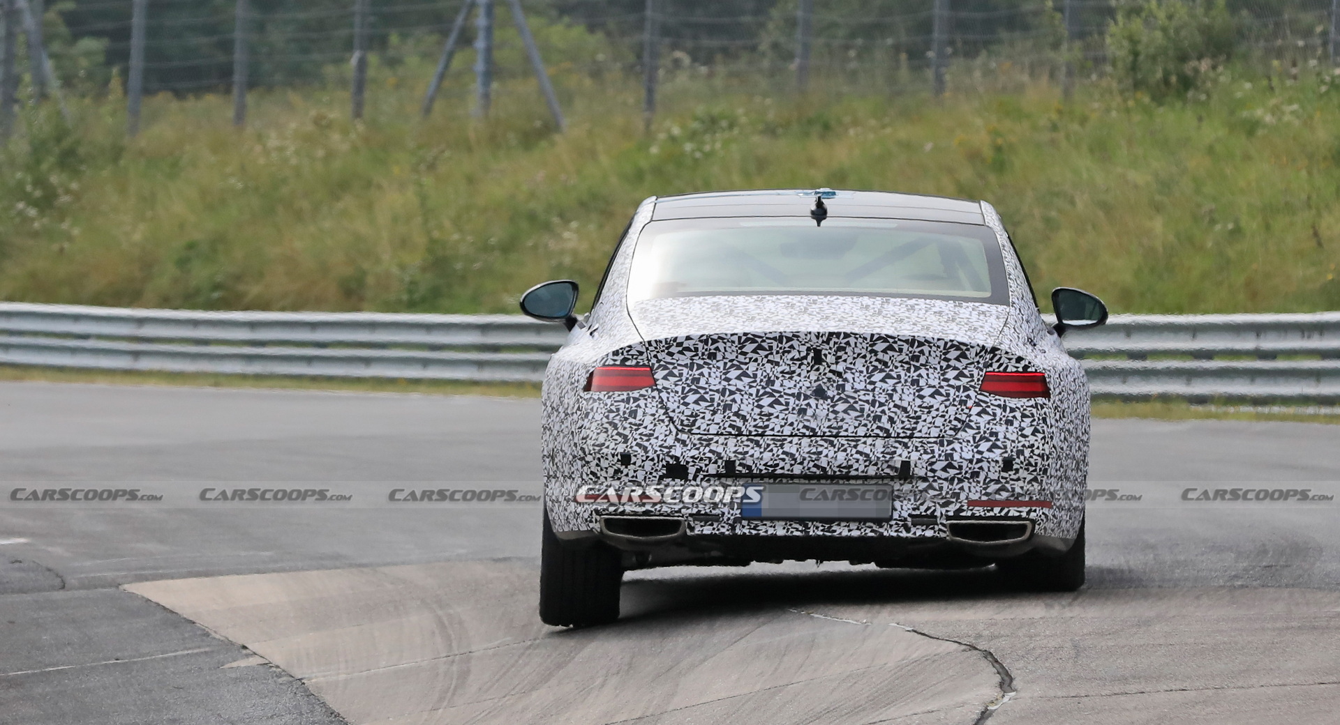 2022 Genesis G90 Caught With Less Camouflage Than Ever Before