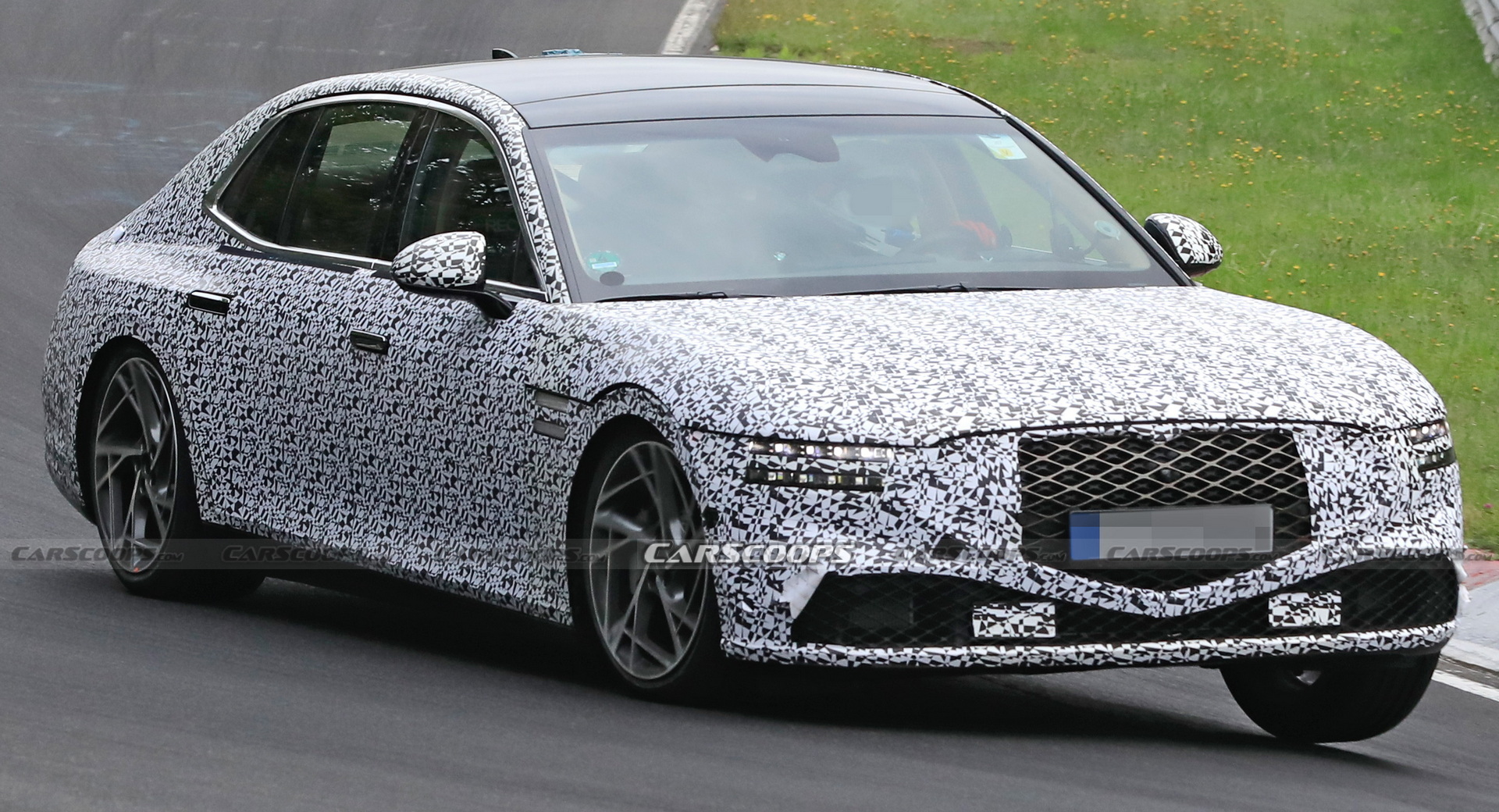 2022 Genesis G90 Caught With Less Camouflage Than Ever Before