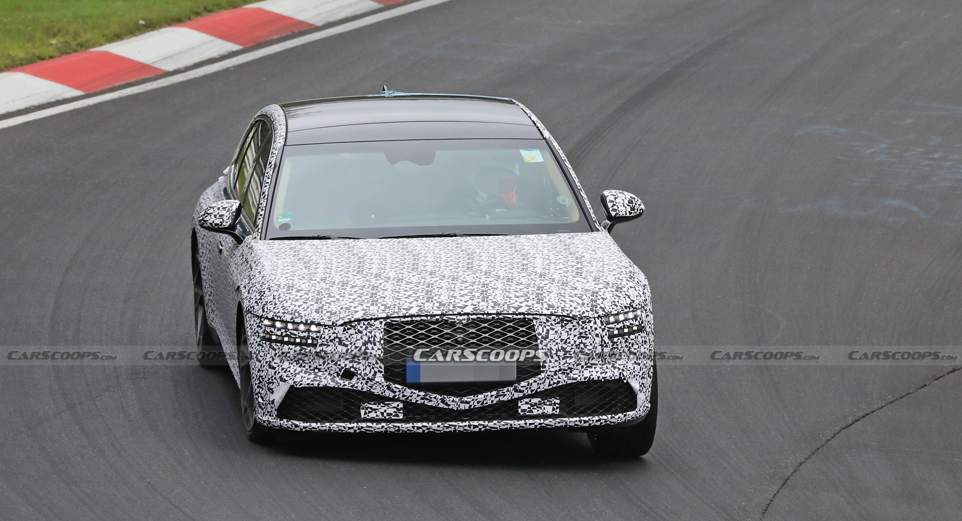 2022 Genesis G90 Caught With Less Camouflage Than Ever Before