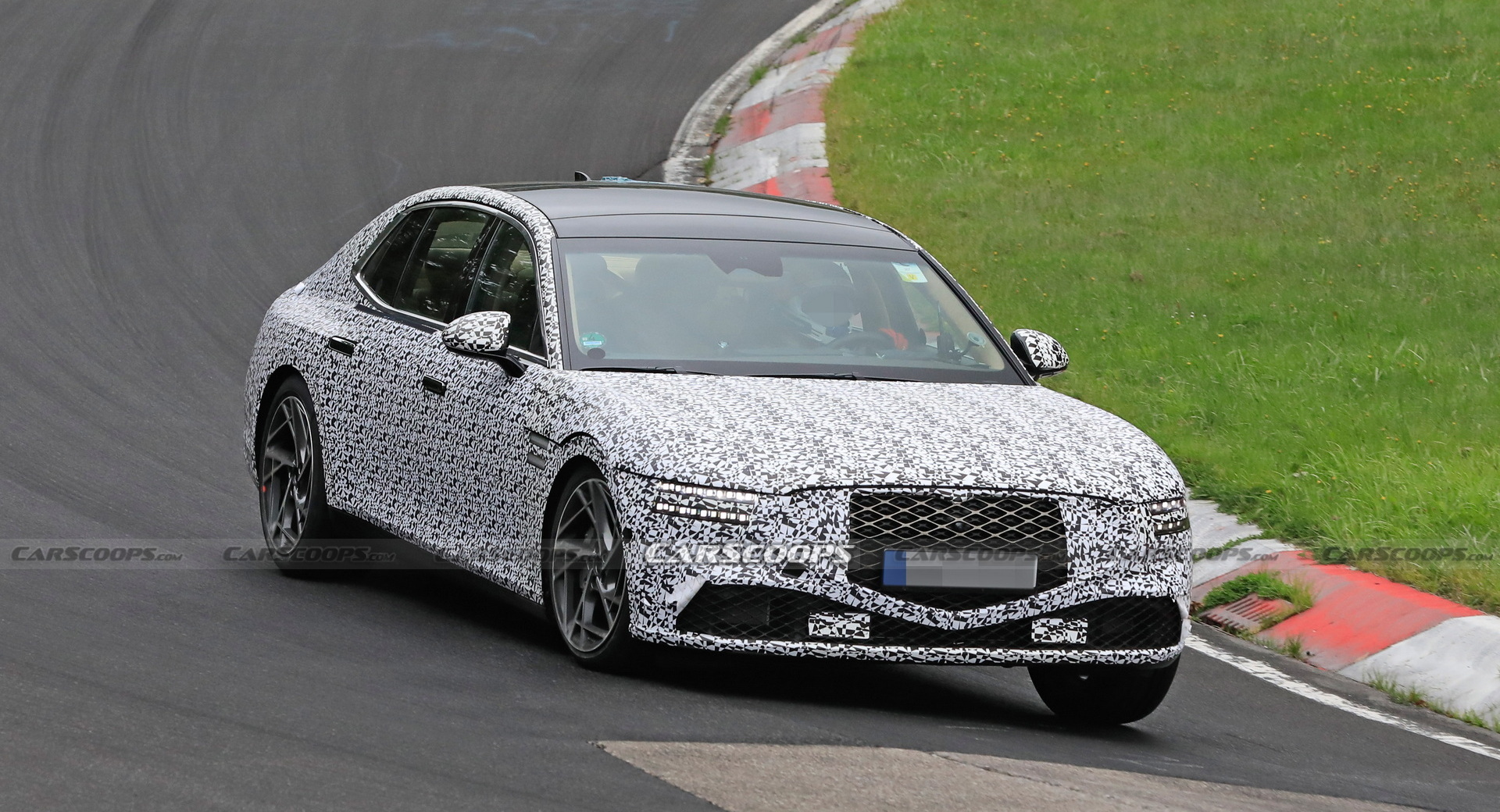 2022 Genesis G90 Caught With Less Camouflage Than Ever Before