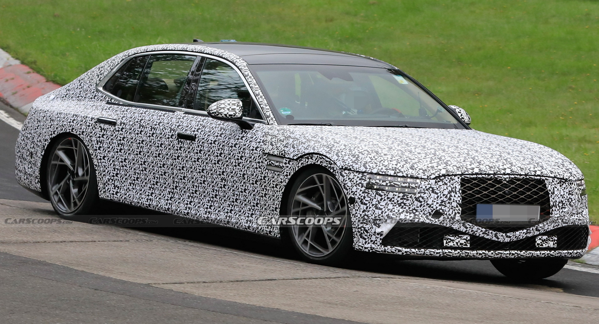 2022 Genesis G90 Caught With Less Camouflage Than Ever Before